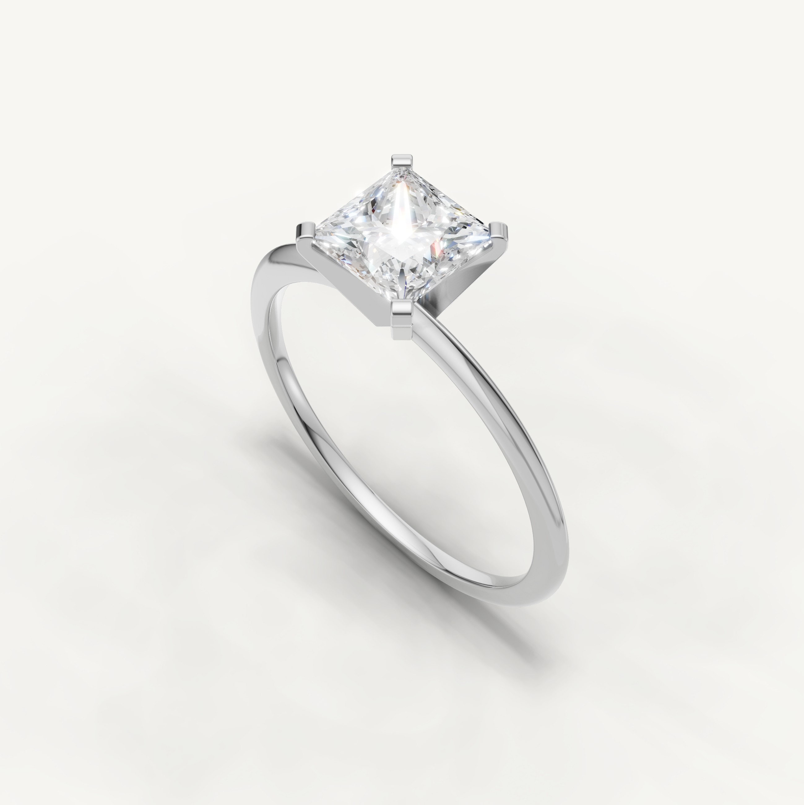 Elegant white gold princess cut engagement ring for women by Raul Diamonds
