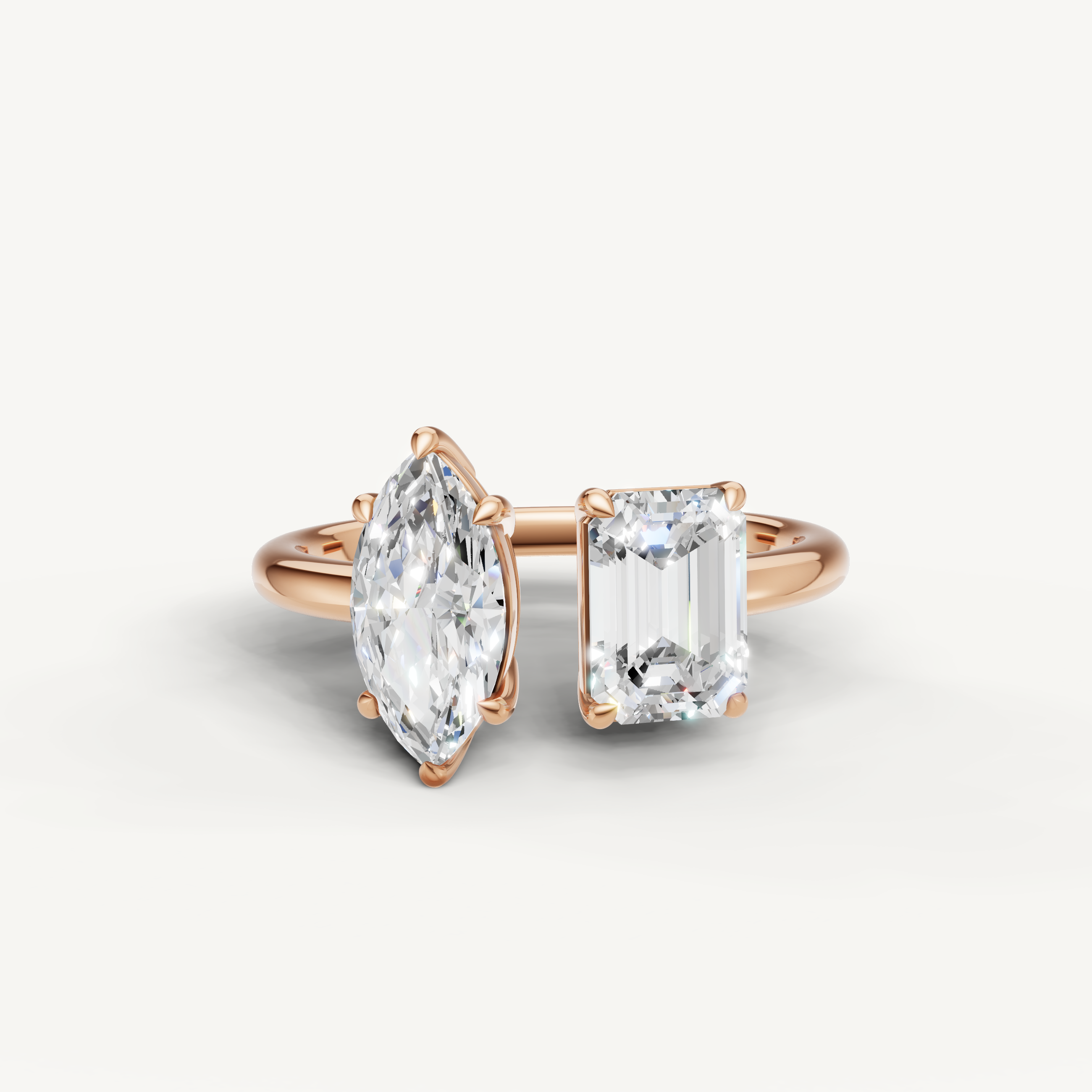 Raul Diamonds toi et moi engagement ring in rose gold with marquise and emerald cut diamonds