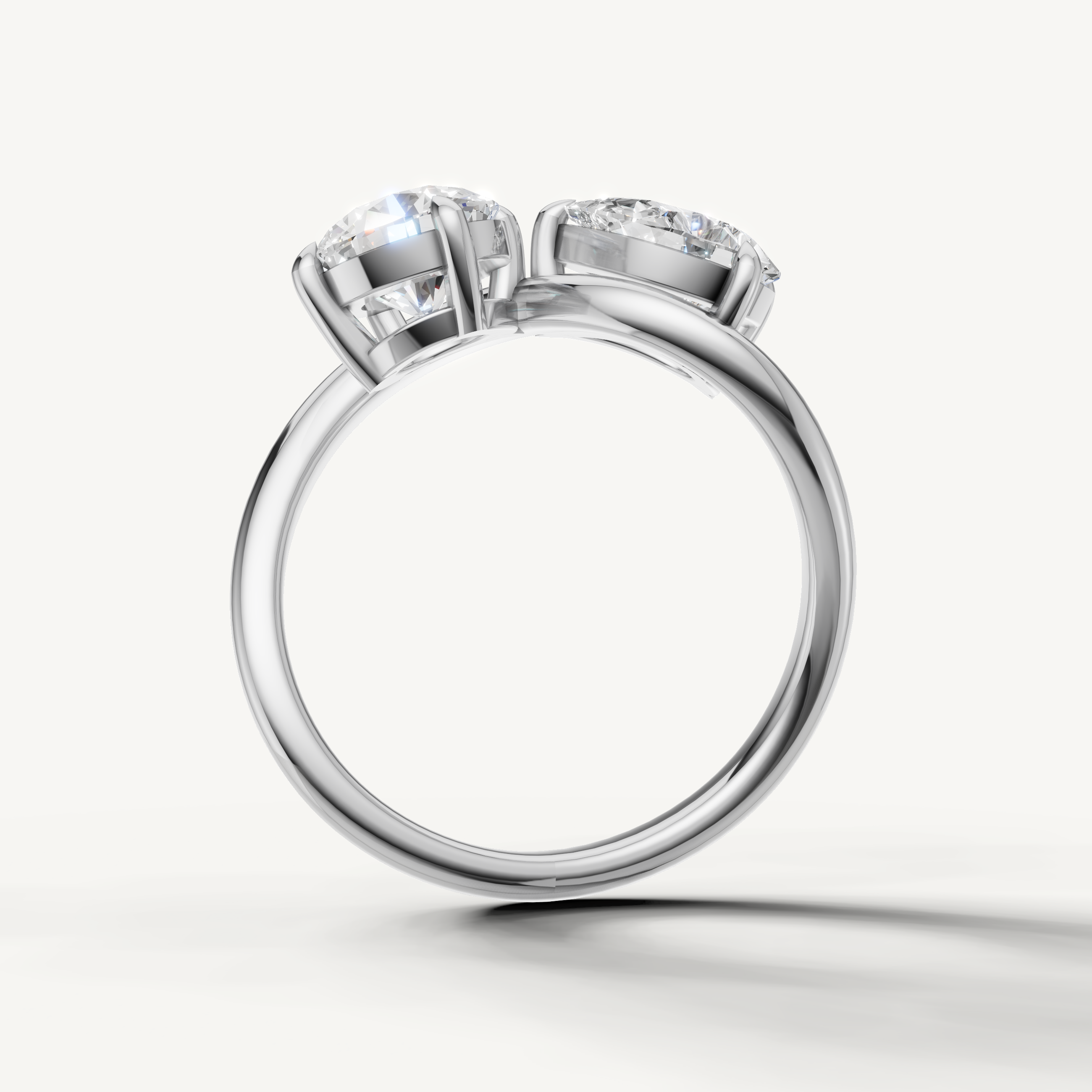 Luxury white gold pear and round cut engagement ring handcrafted by Raul Diamonds