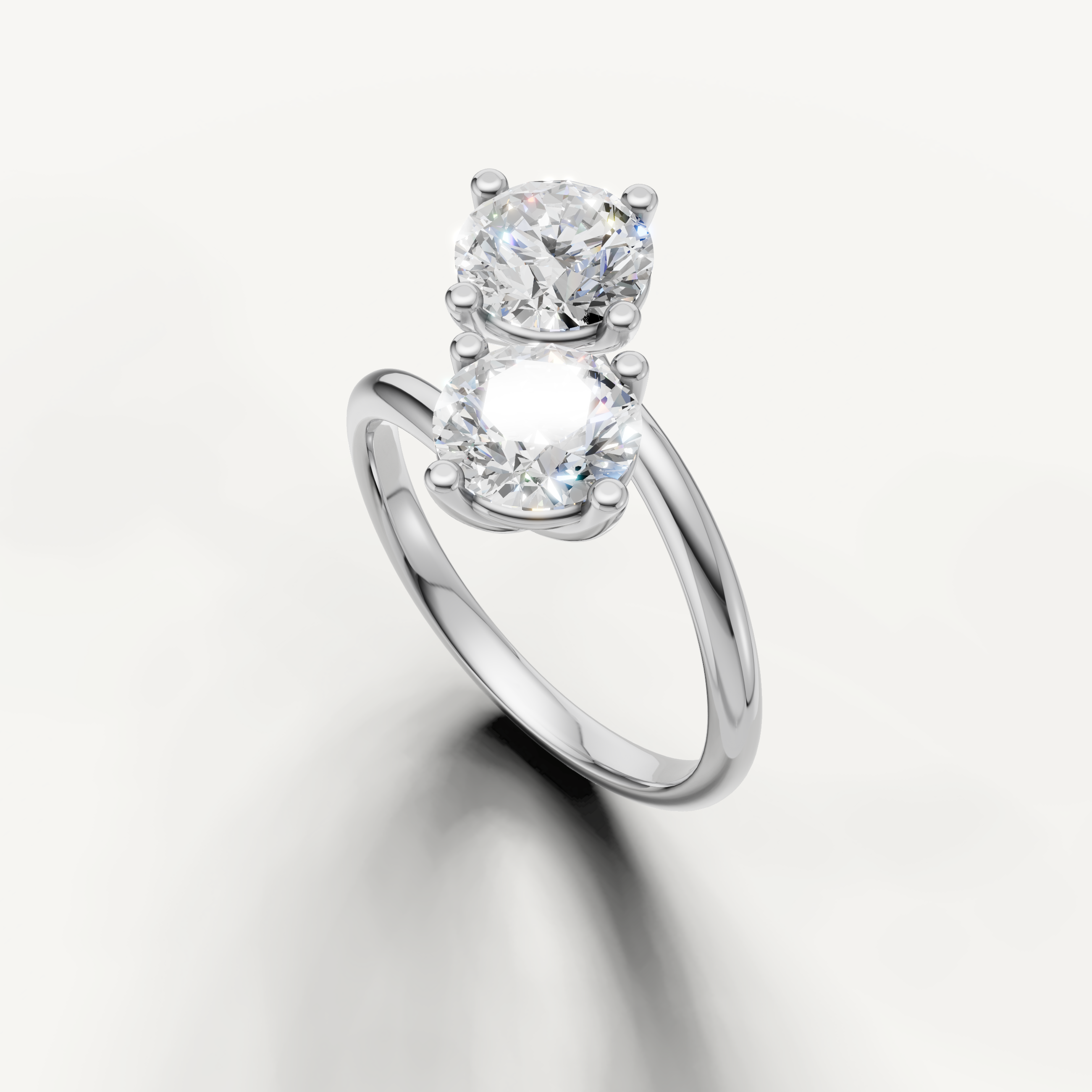 Luxury white gold open style ring featuring round solitaire diamonds from Raul Diamonds