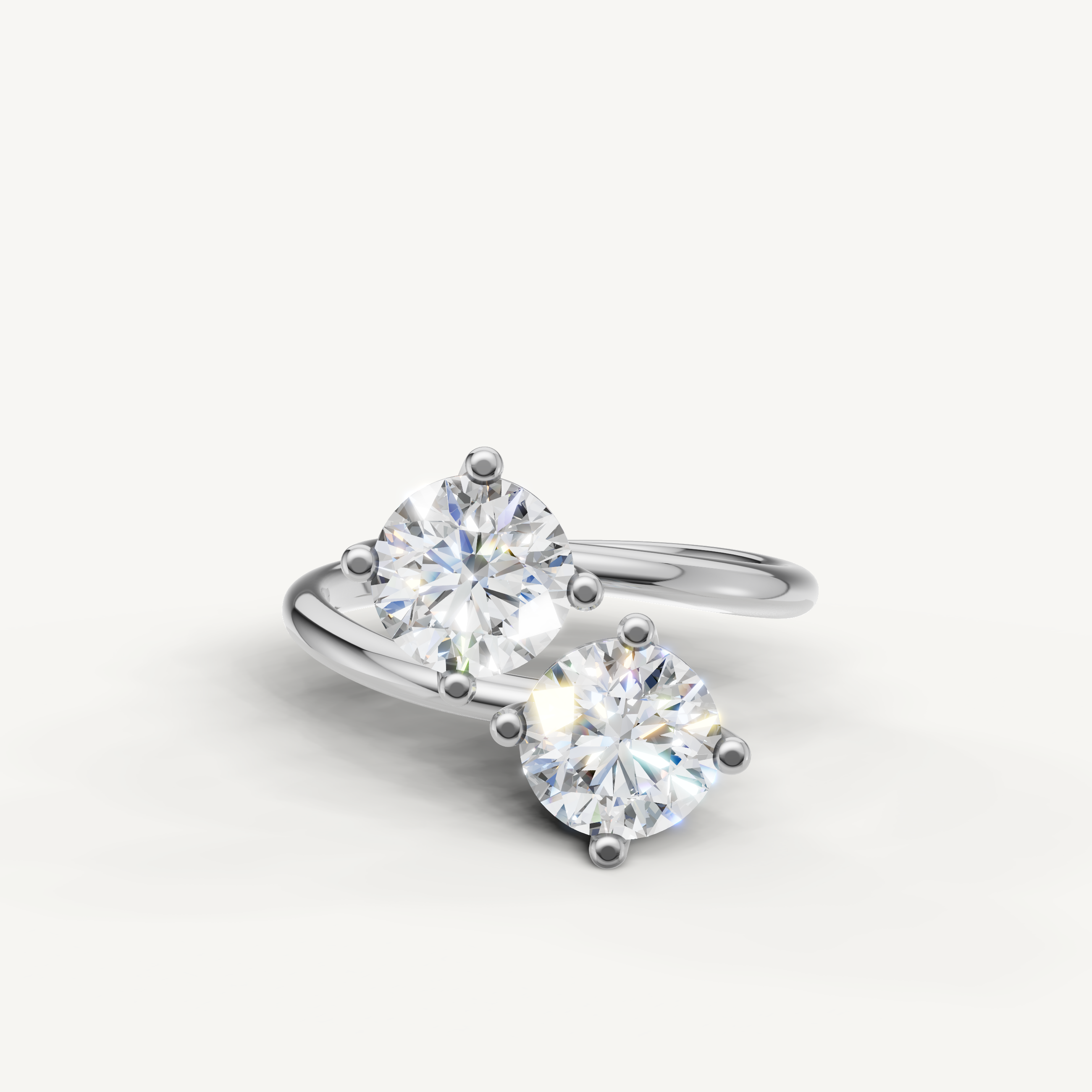Raul Diamonds white gold bypass engagement ring with dual round cut lab diamonds