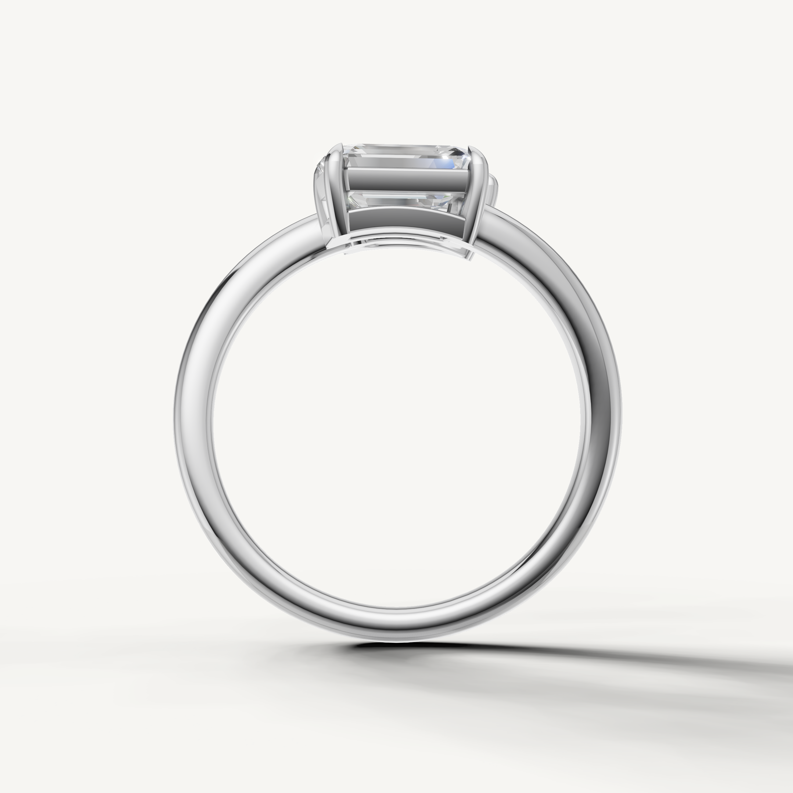 White gold designer engagement ring with pear cut and emerald cut diamonds for women