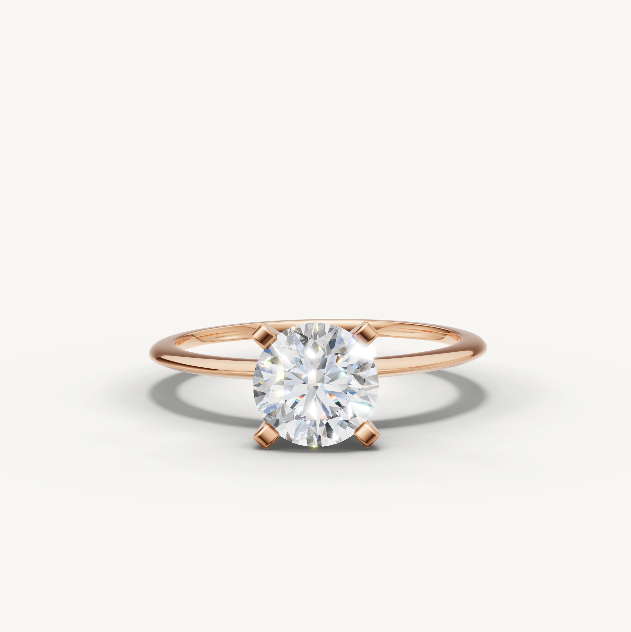 Round cut lab grown diamond solitaire engagement ring in rose gold by Raul Diamonds