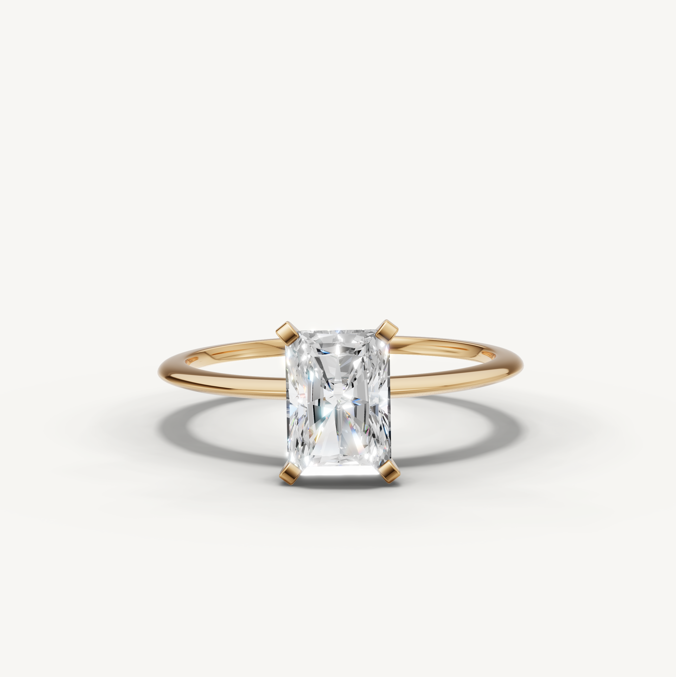 Radiant cut lab grown diamond solitaire engagement ring in yellow gold by Raul Diamonds