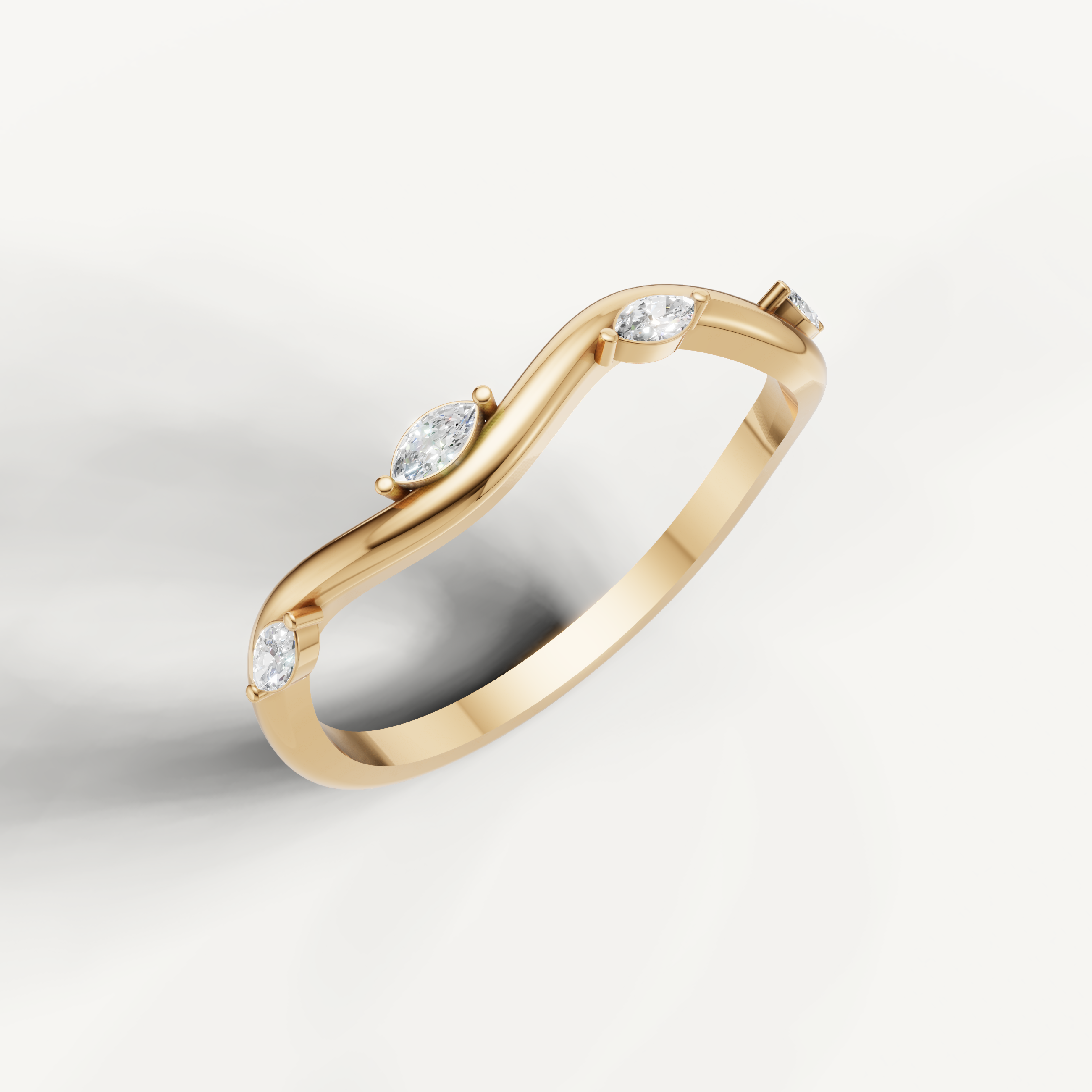 Yellow gold wave style diamond wedding ring featuring marquise and round diamonds