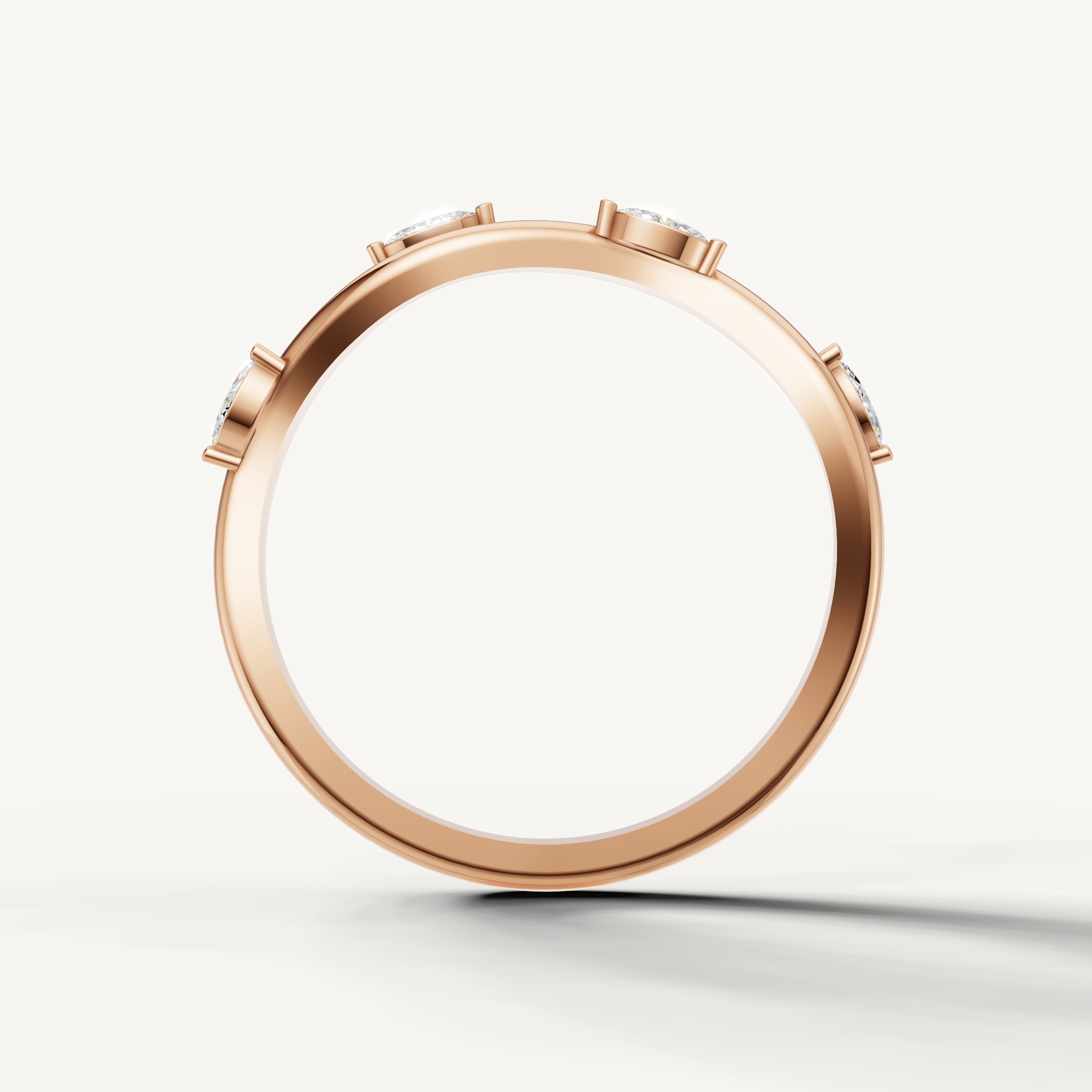 Rose gold modern twisted wedding band with floating marquise diamond accents