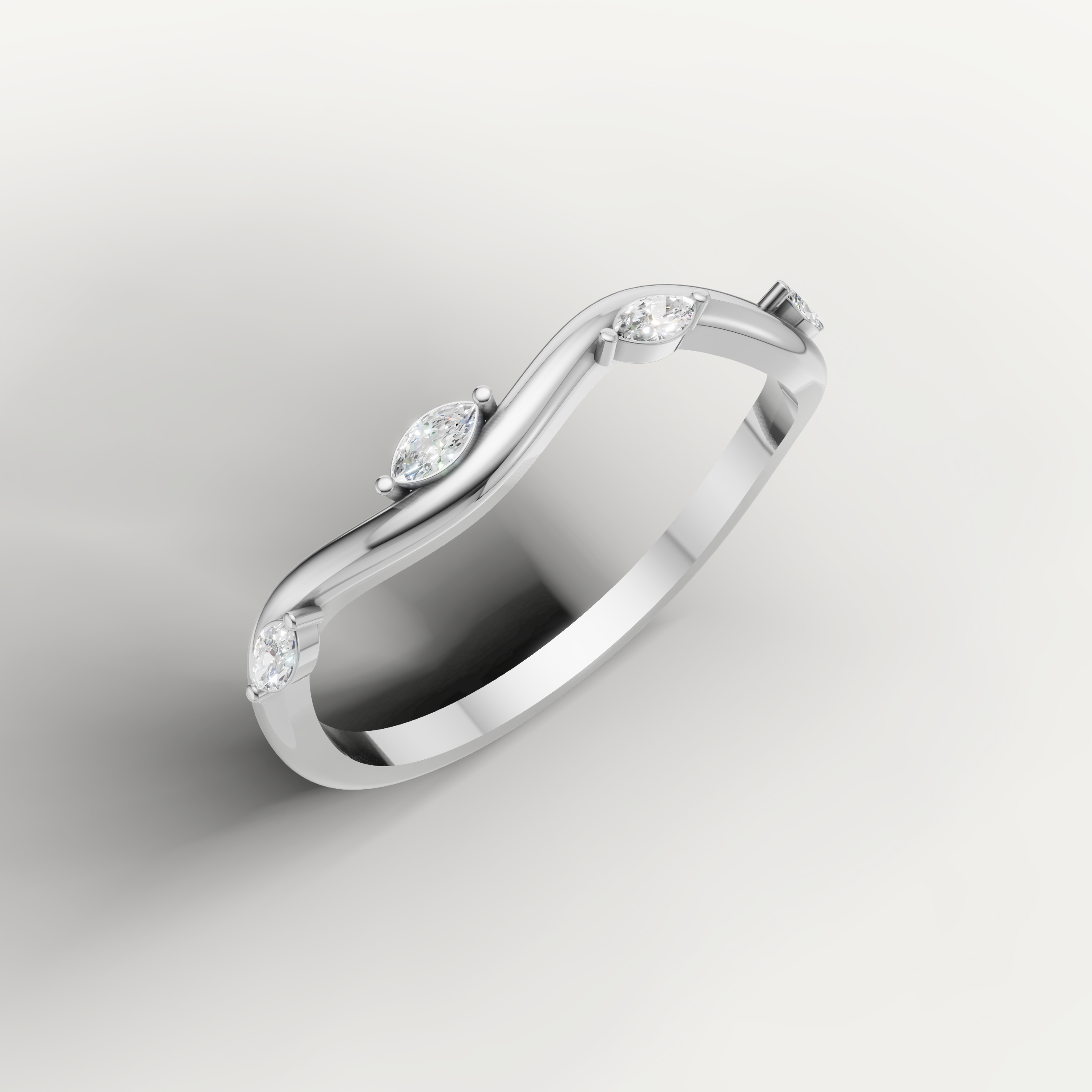 White gold diamond wedding ring featuring marquise and round brilliant stones