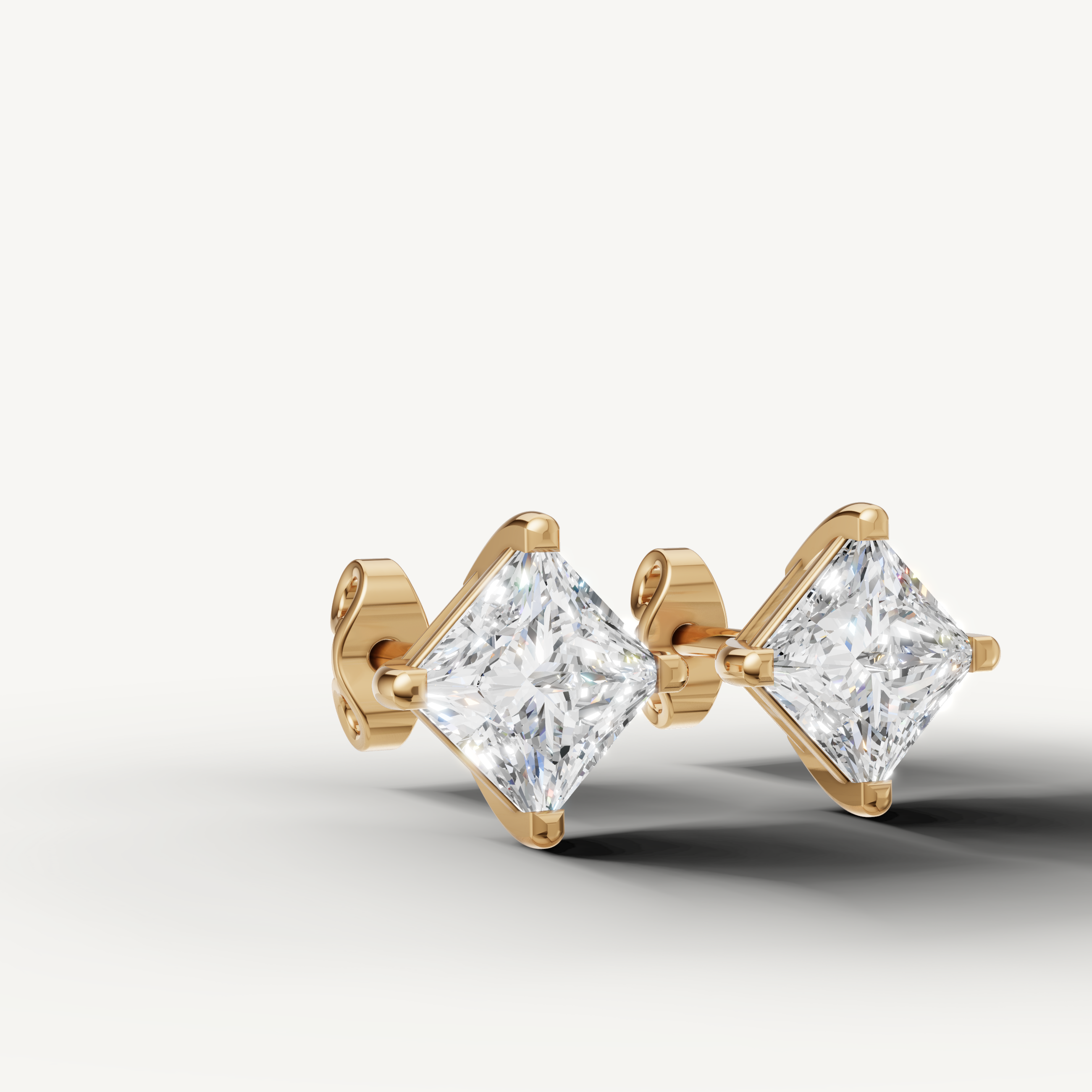 Raul Diamonds yellow gold geometric diamond stud earrings for modern luxury style