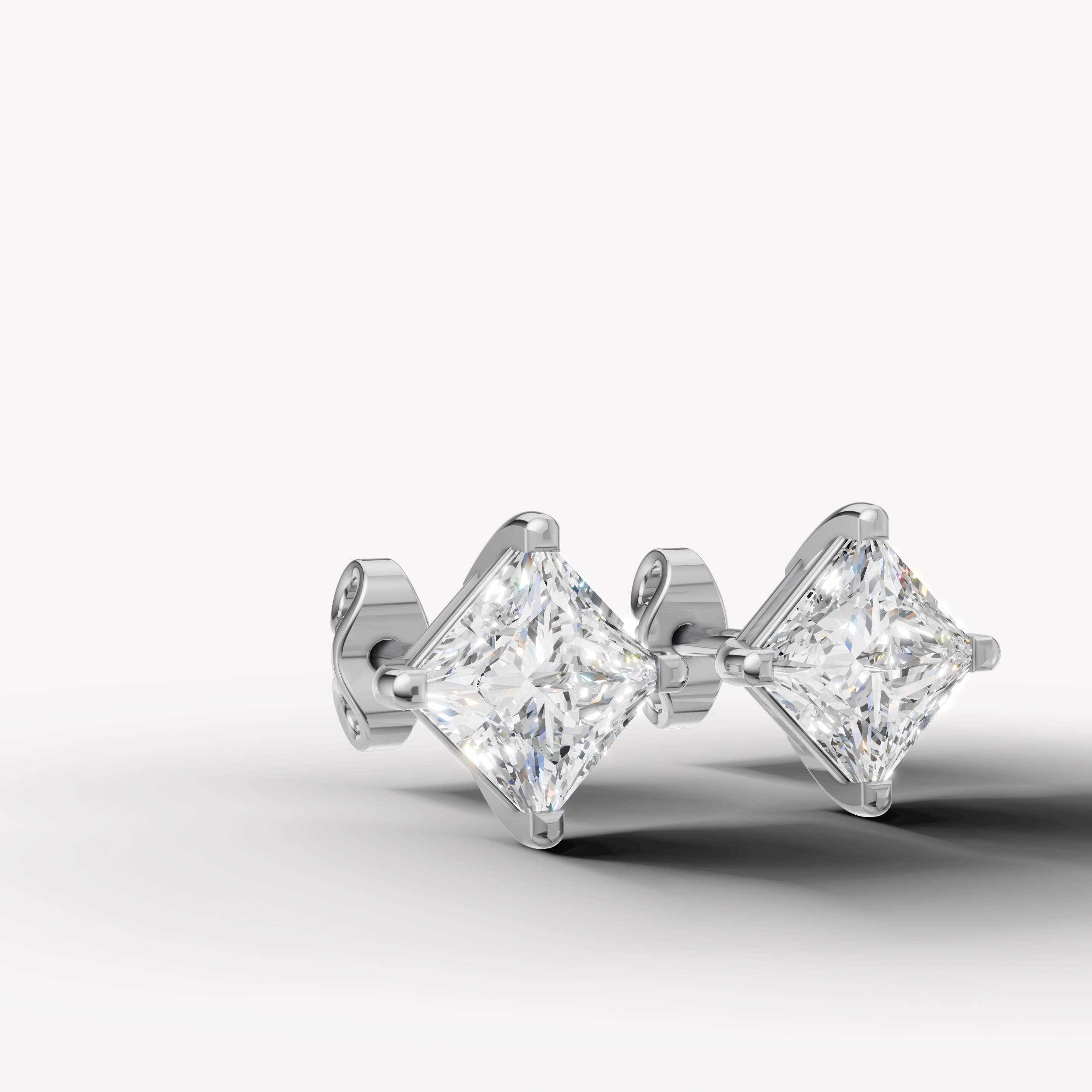 Raul Diamonds white gold geometric diamond stud earrings for contemporary elegance