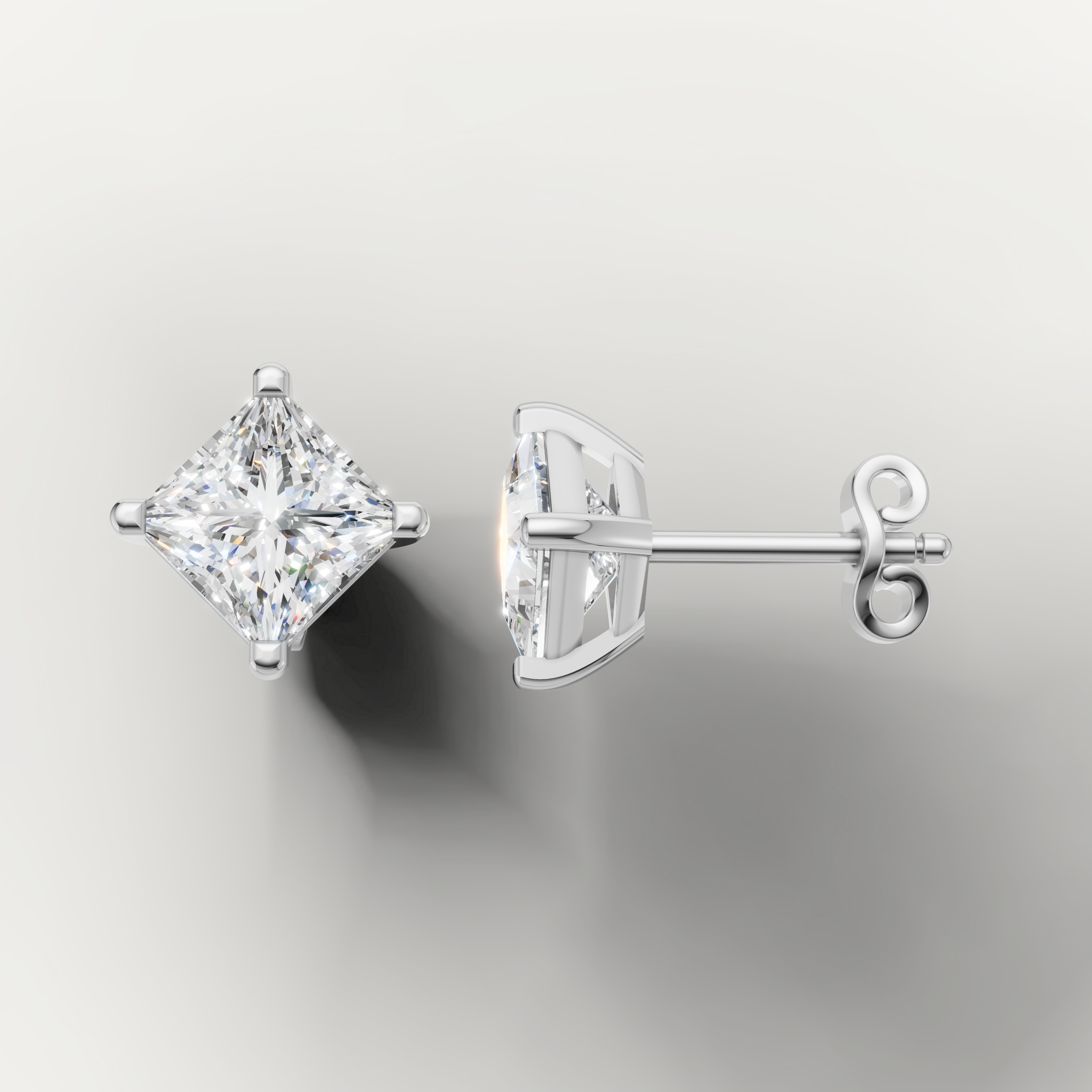 White gold solitaire princess diamond earrings by Raul Diamonds with radiant sparkle