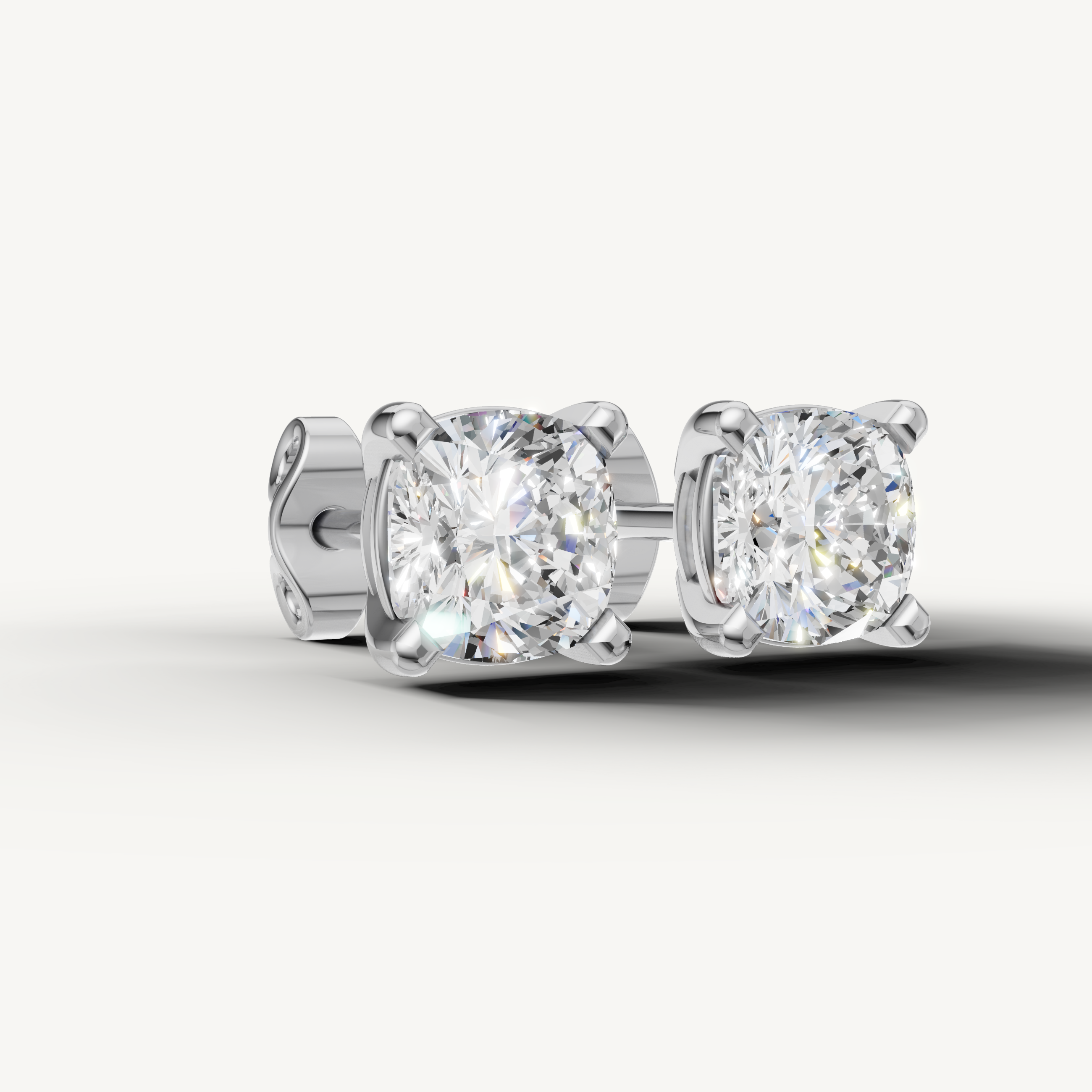 Raul Diamonds white gold cushion cut diamond stud earrings for modern luxury style