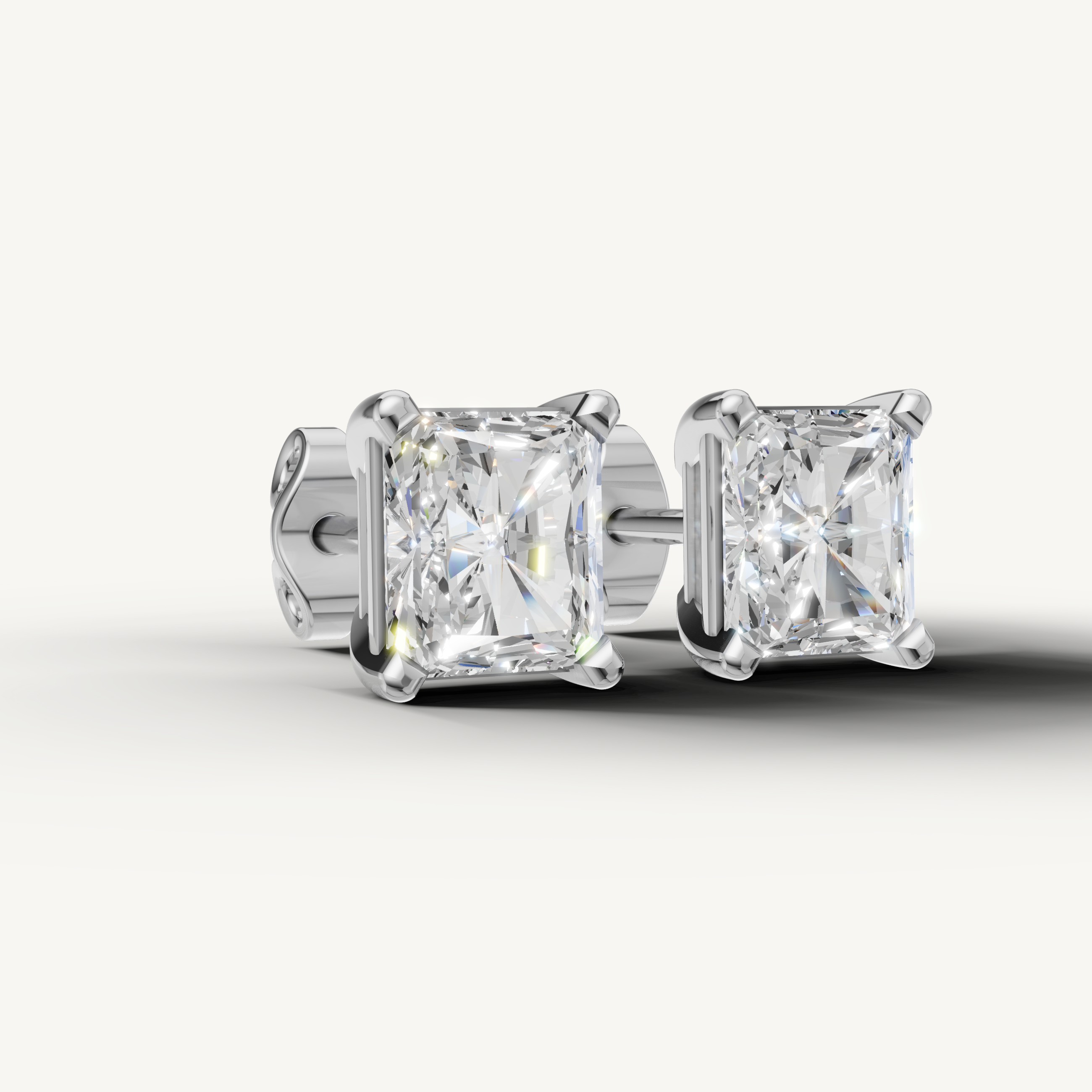Raul Diamonds white gold radiant cut diamond stud earrings for timeless sophistication