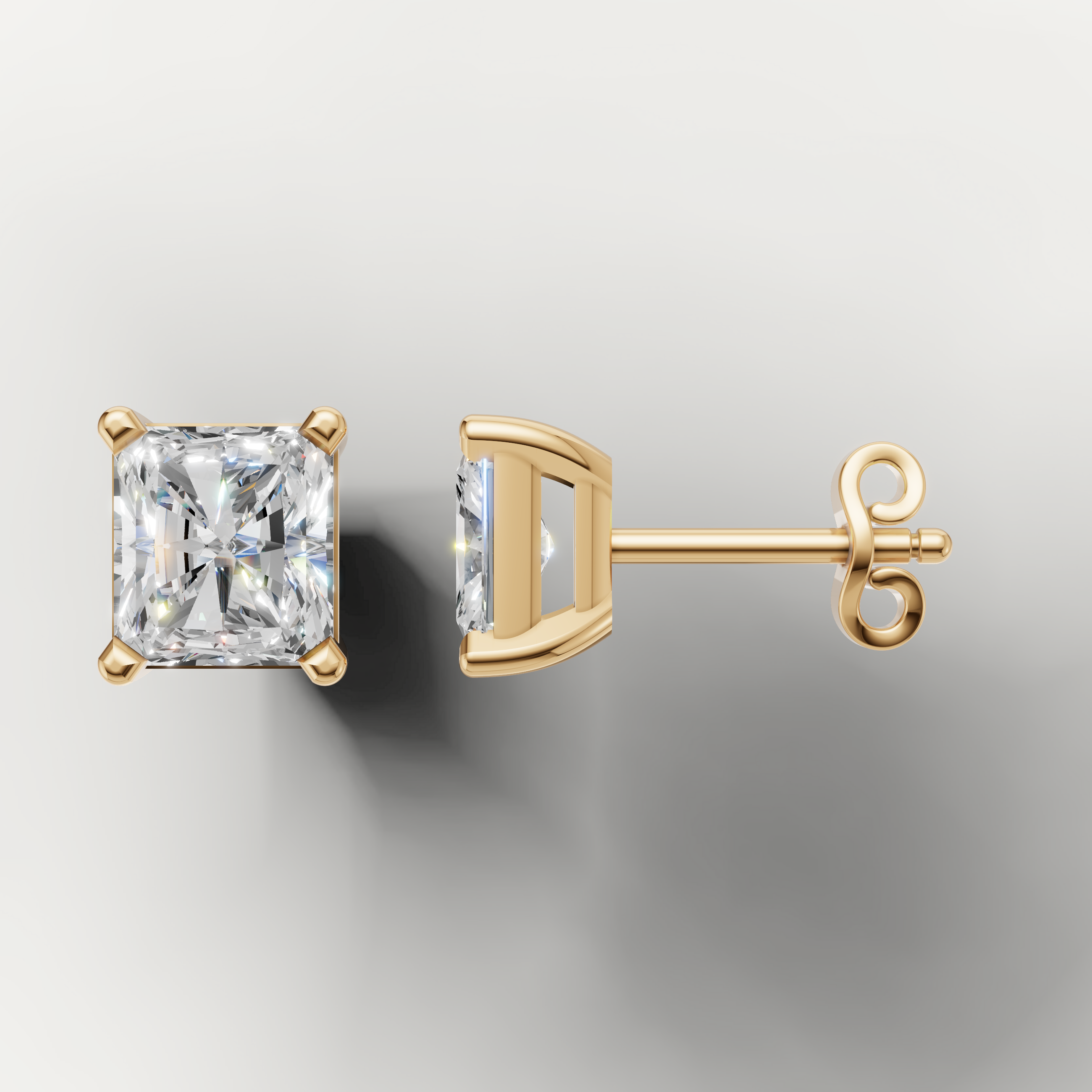 Yellow gold radiant solitaire diamond earrings by Raul Diamonds with elegant sparkle
