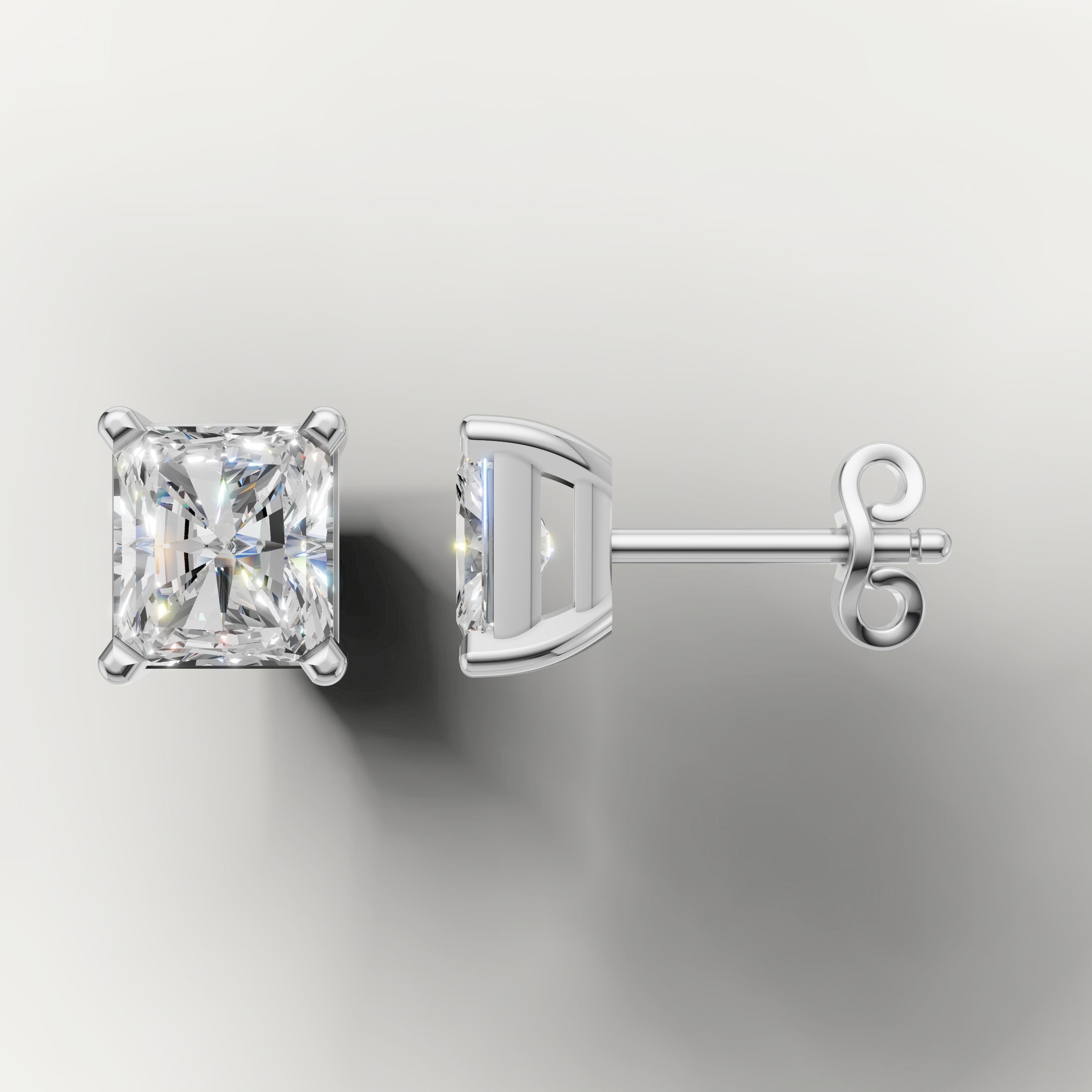 White gold radiant solitaire diamond earrings by Raul Diamonds with elegant luxury style