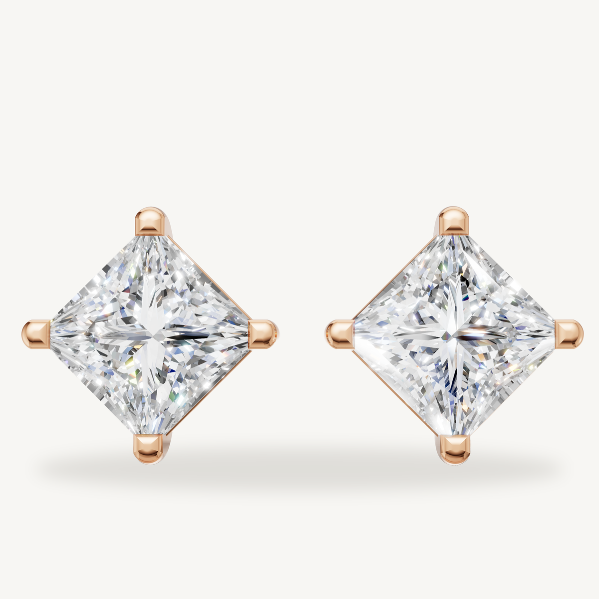 Princess cut lab grown diamond stud earrings in 14K rose gold by Raul Diamonds