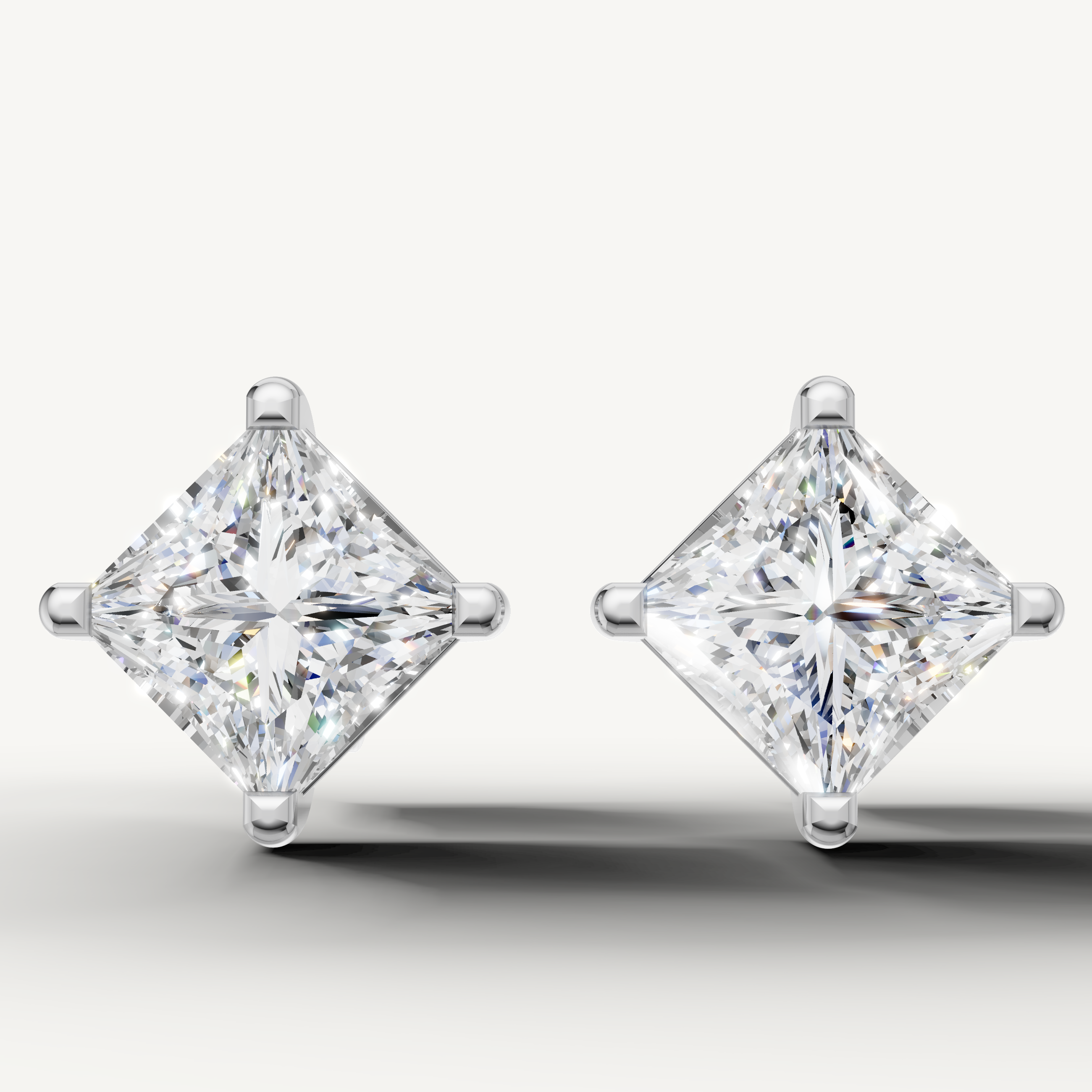 Princess cut lab grown diamond stud earrings in 14K white gold by Raul Diamonds