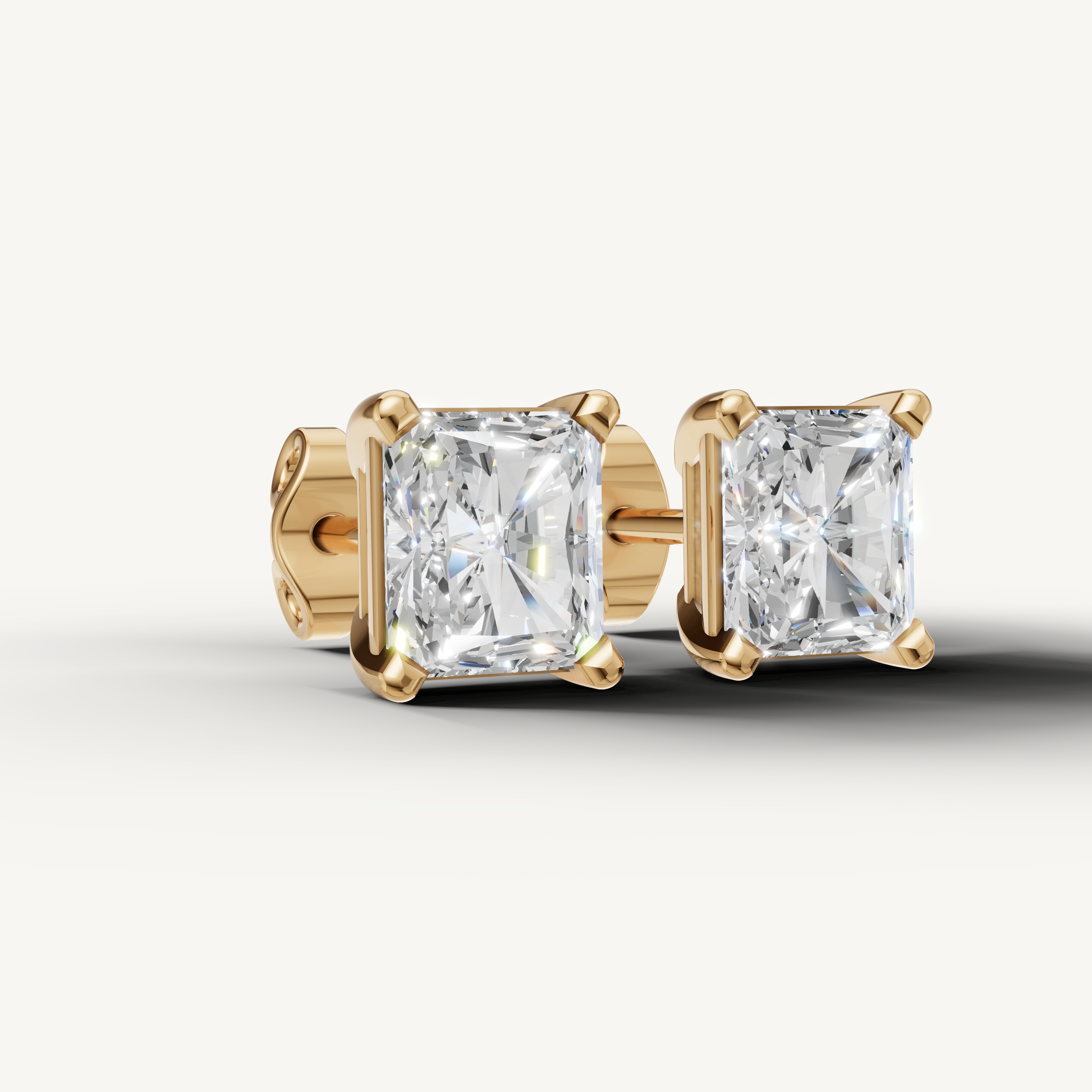 Raul Diamonds yellow gold radiant cut diamond stud earrings for luxury everyday wear