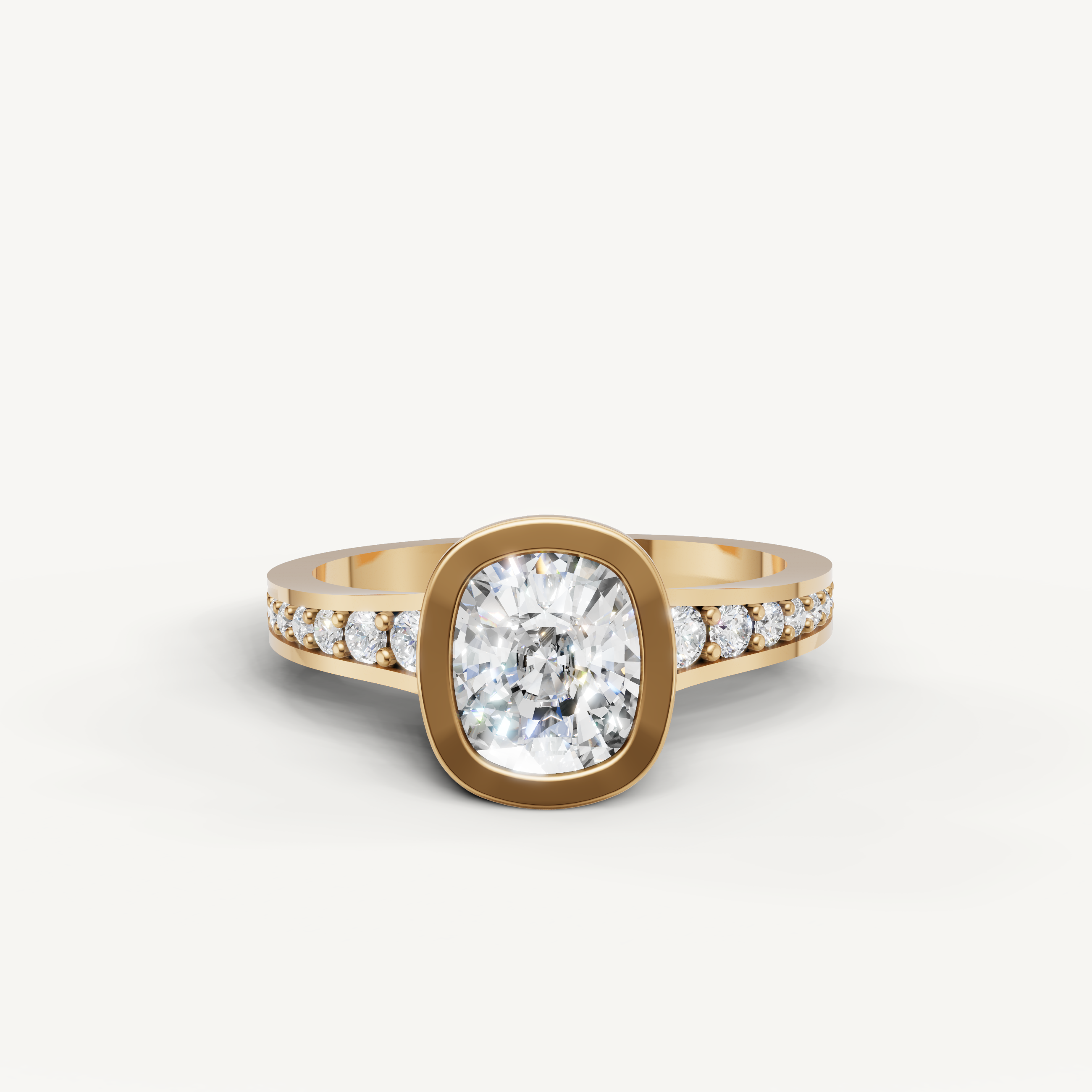 Seo yellow gold bezel cushion diamond engagement ring with pavé band by Raul Diamonds.