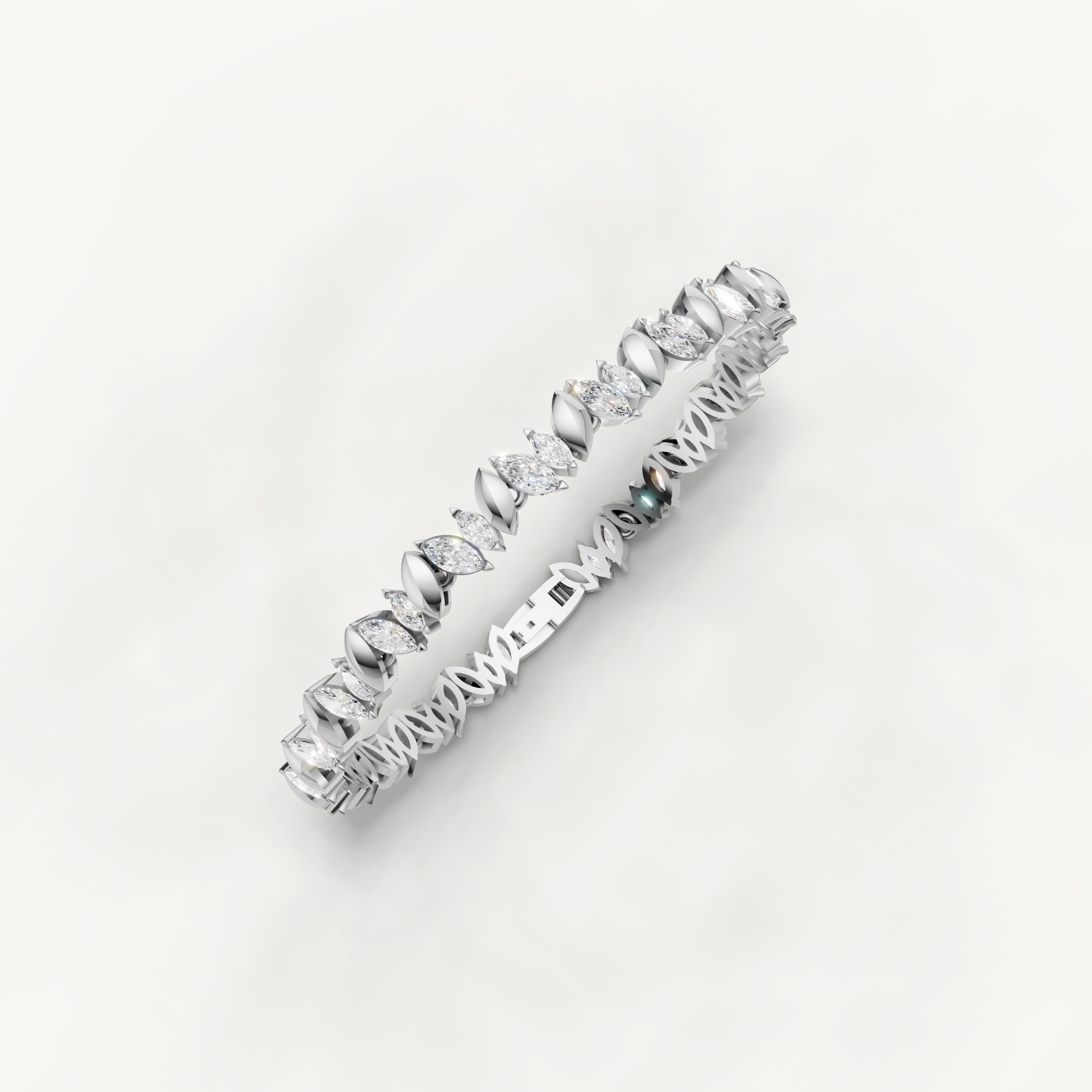 White gold fine jewelry bracelet with elegant marquise diamond detailing by Raul Diamonds