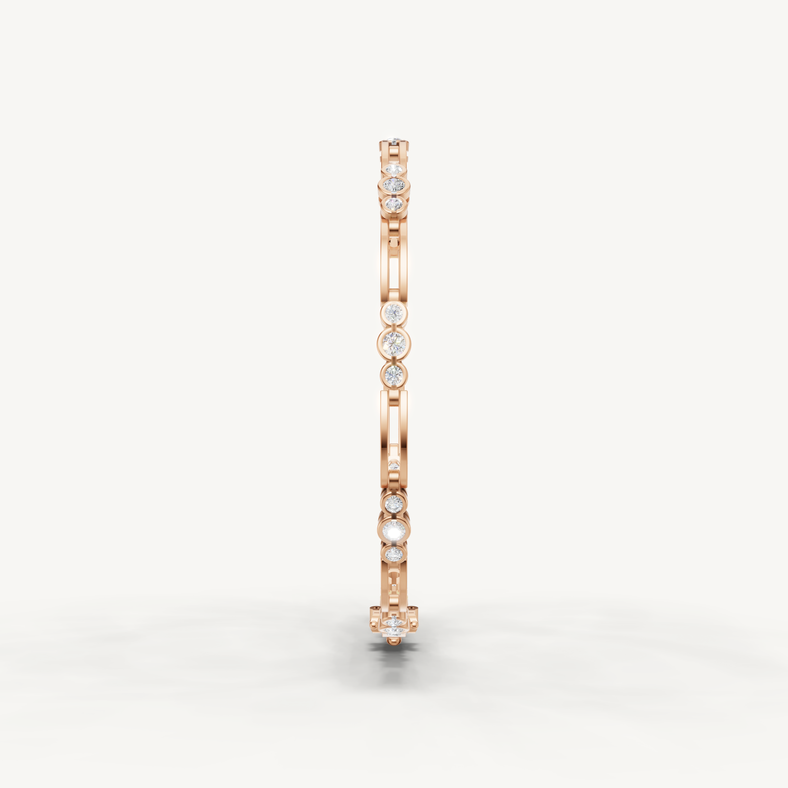 Elegant rose gold diamond bracelet featuring bezel set round brilliant diamonds by Raul Diamonds