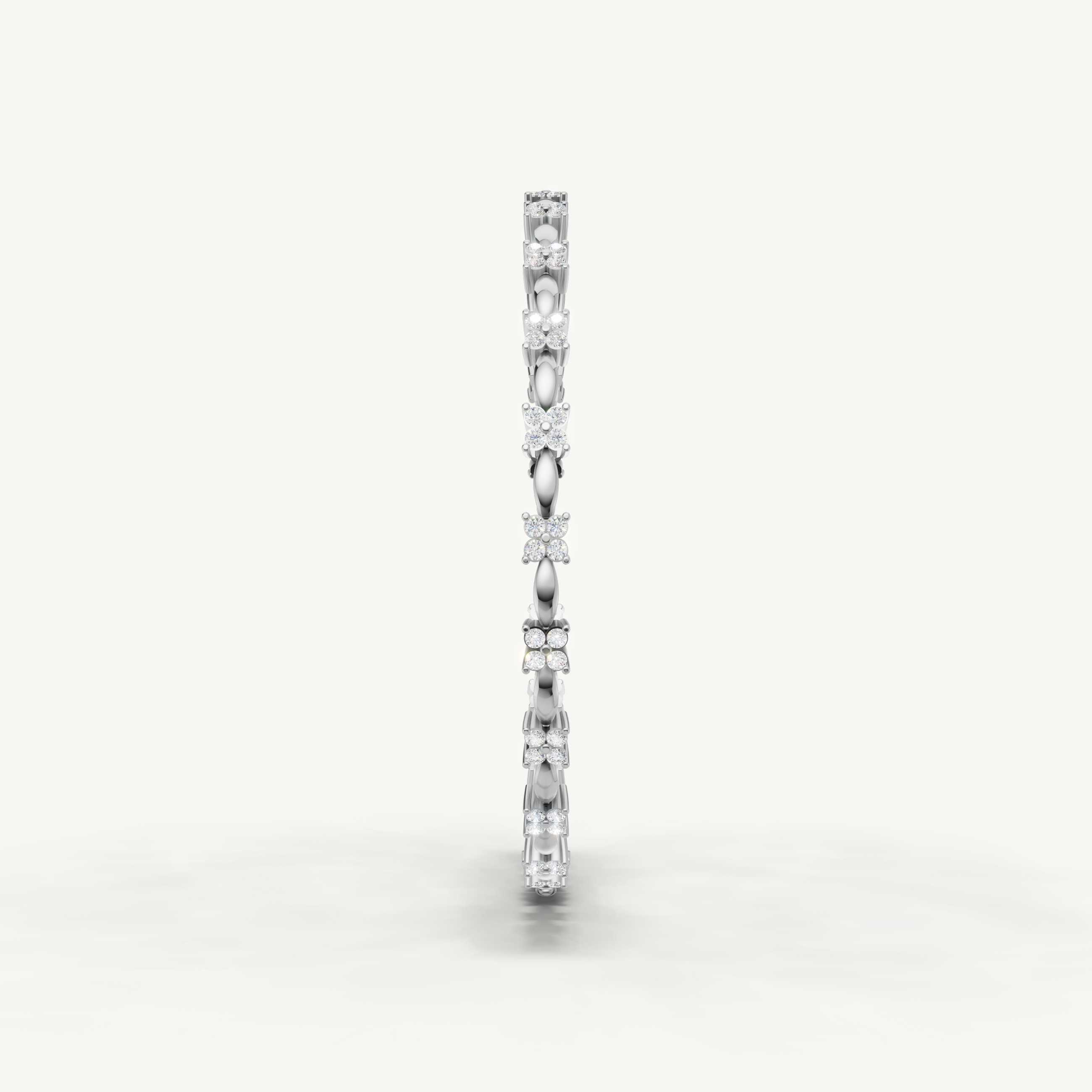 Elegant white gold diamond bracelet featuring floral inspired diamond clusters by Raul Diamonds