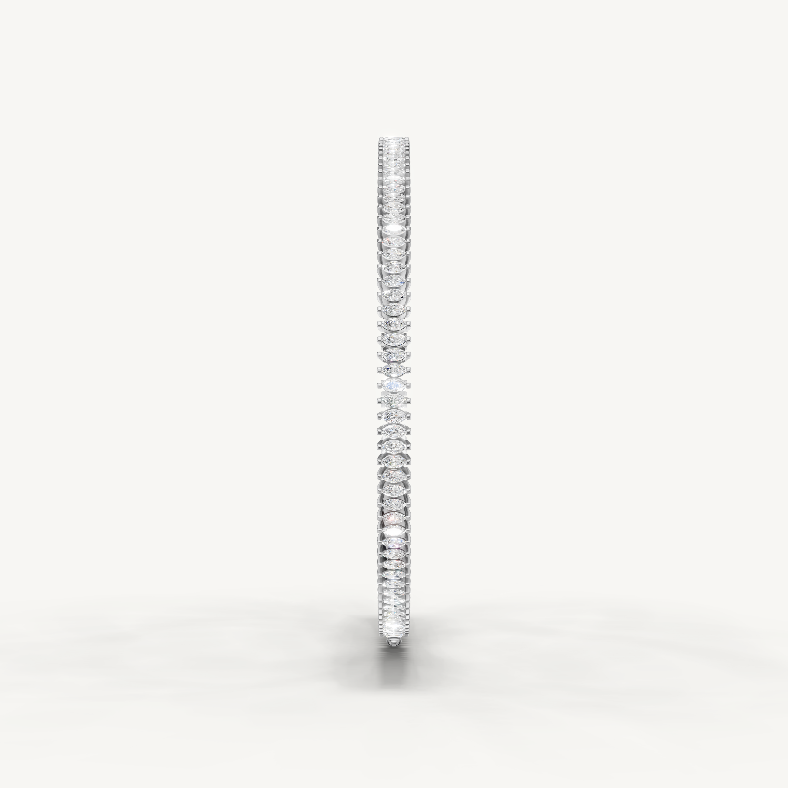 Luxury white gold diamond bracelet featuring sleek marquise cut diamonds by Raul Diamonds