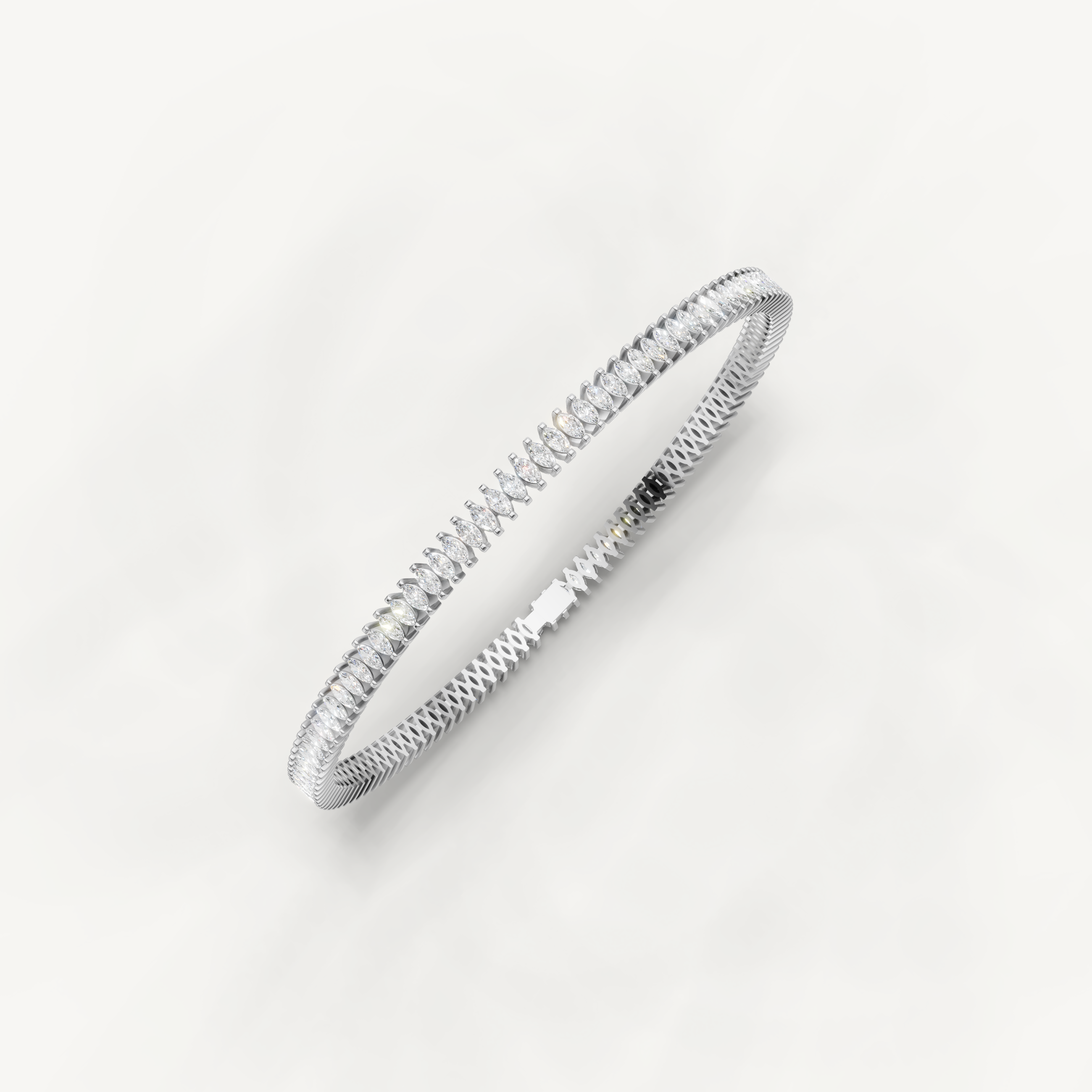 White gold fine jewelry tennis bracelet with elegant marquise diamond styling by Raul Diamonds