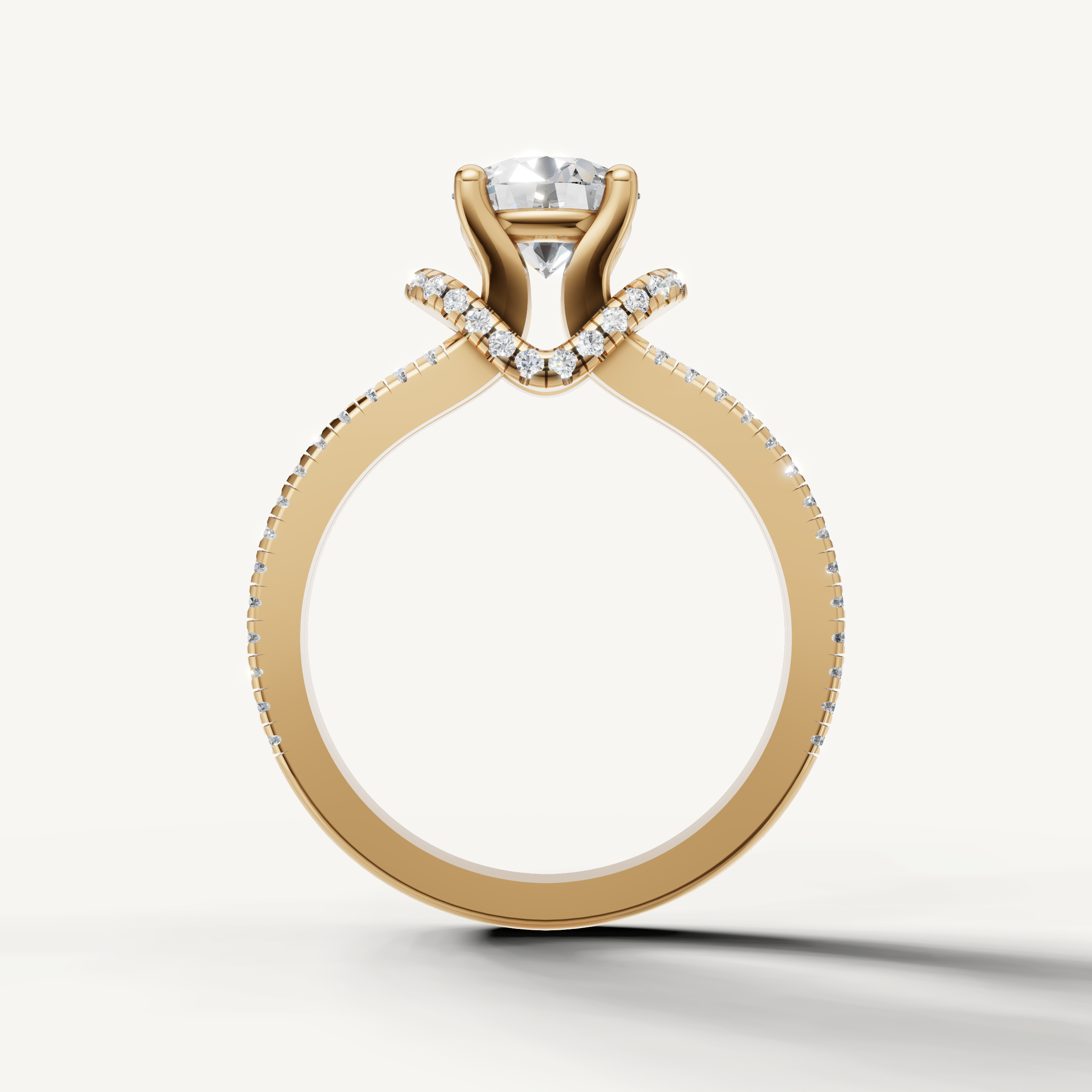 Classic yellow gold round diamond bridal ring with elegant split band from Raul Diamonds.