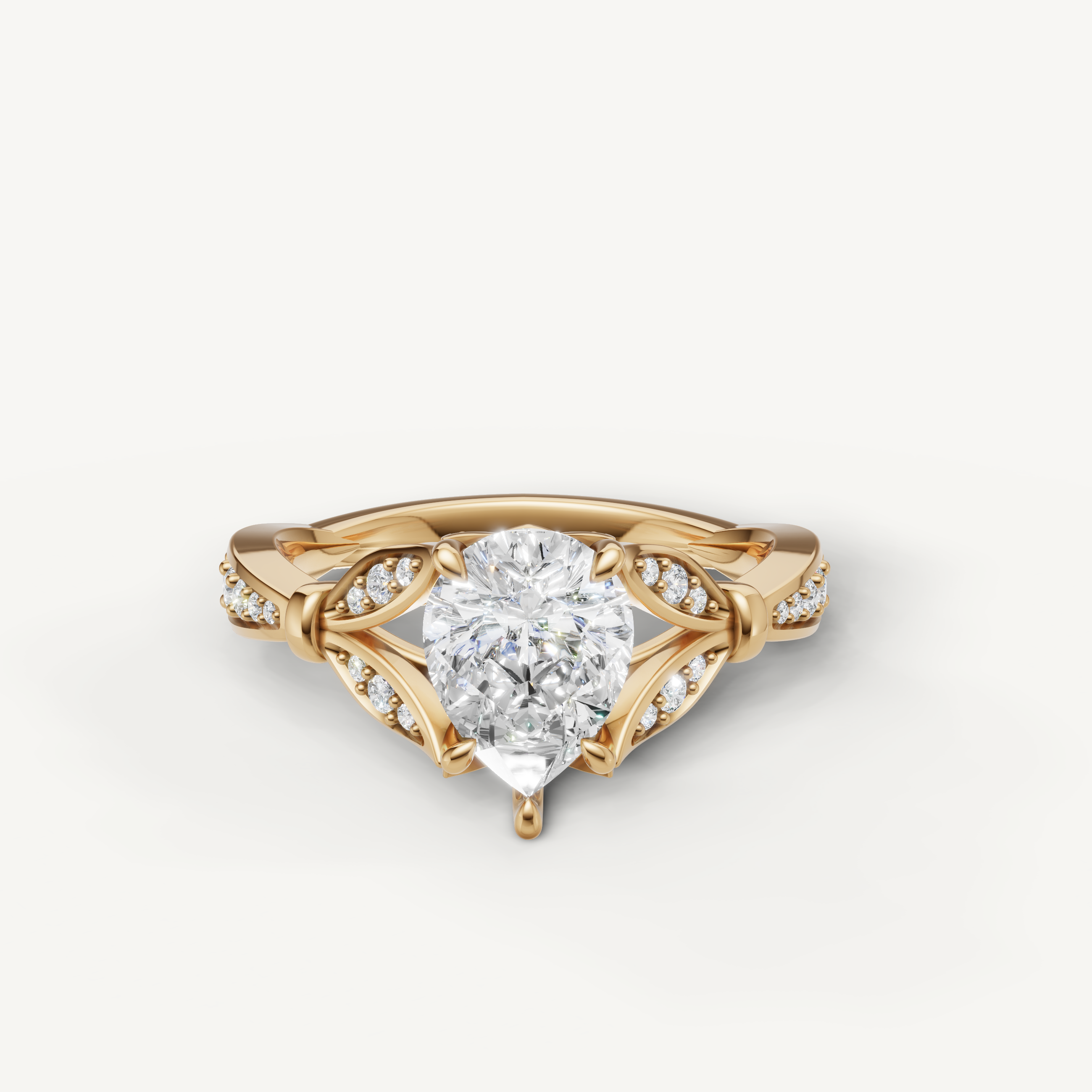 Pear cut lab grown diamond engagement ring in 14K yellow gold with vintage pavé detailing by Raul Diamonds
