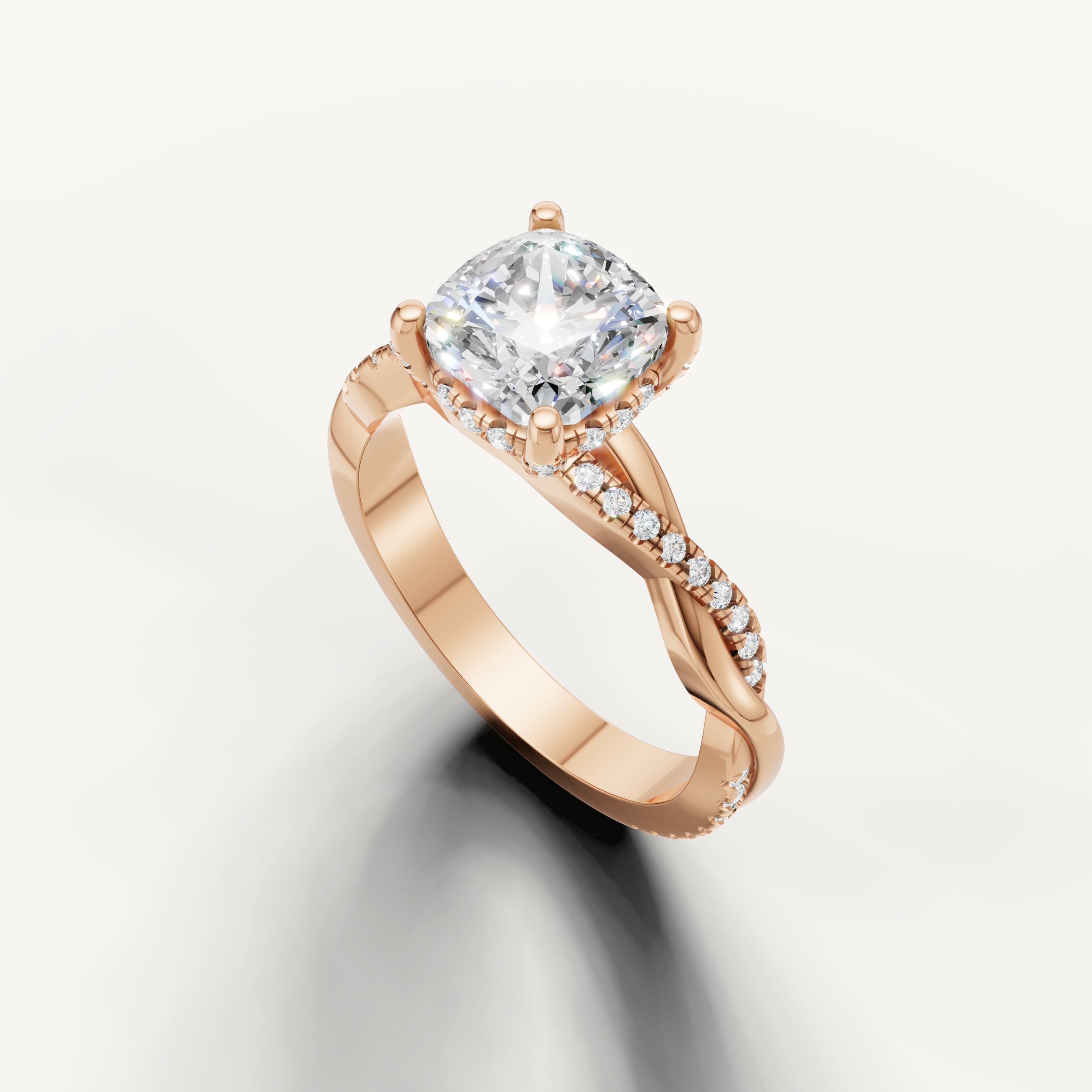 14k rose gold cushion cut lab grown diamond ring featuring a crossover shank and hidden halo sparkle