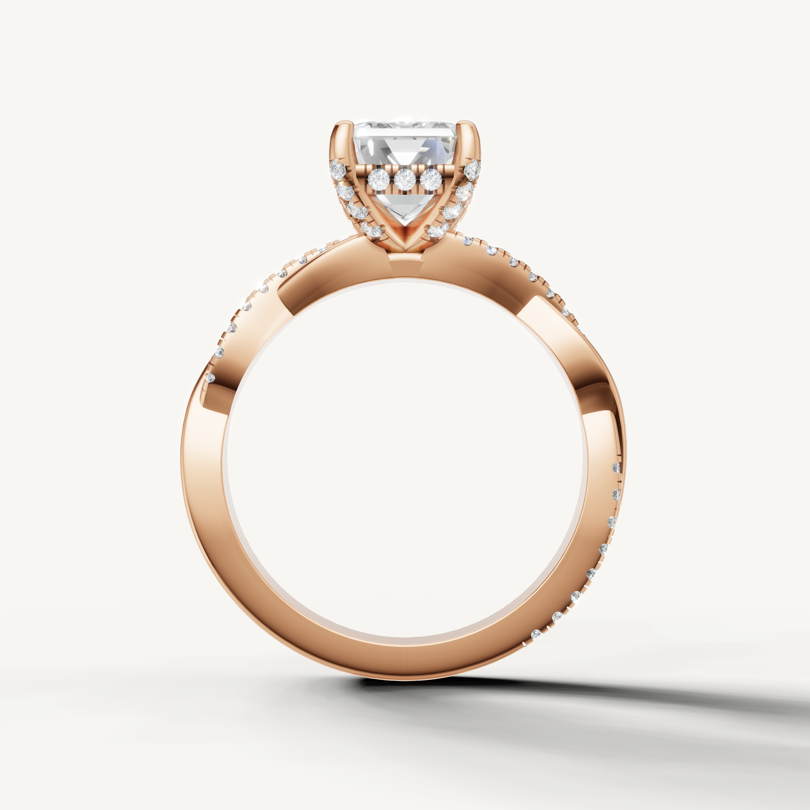 Unique rose gold wedding jewelry from Raul Diamonds featuring a stunning emerald cut diamond