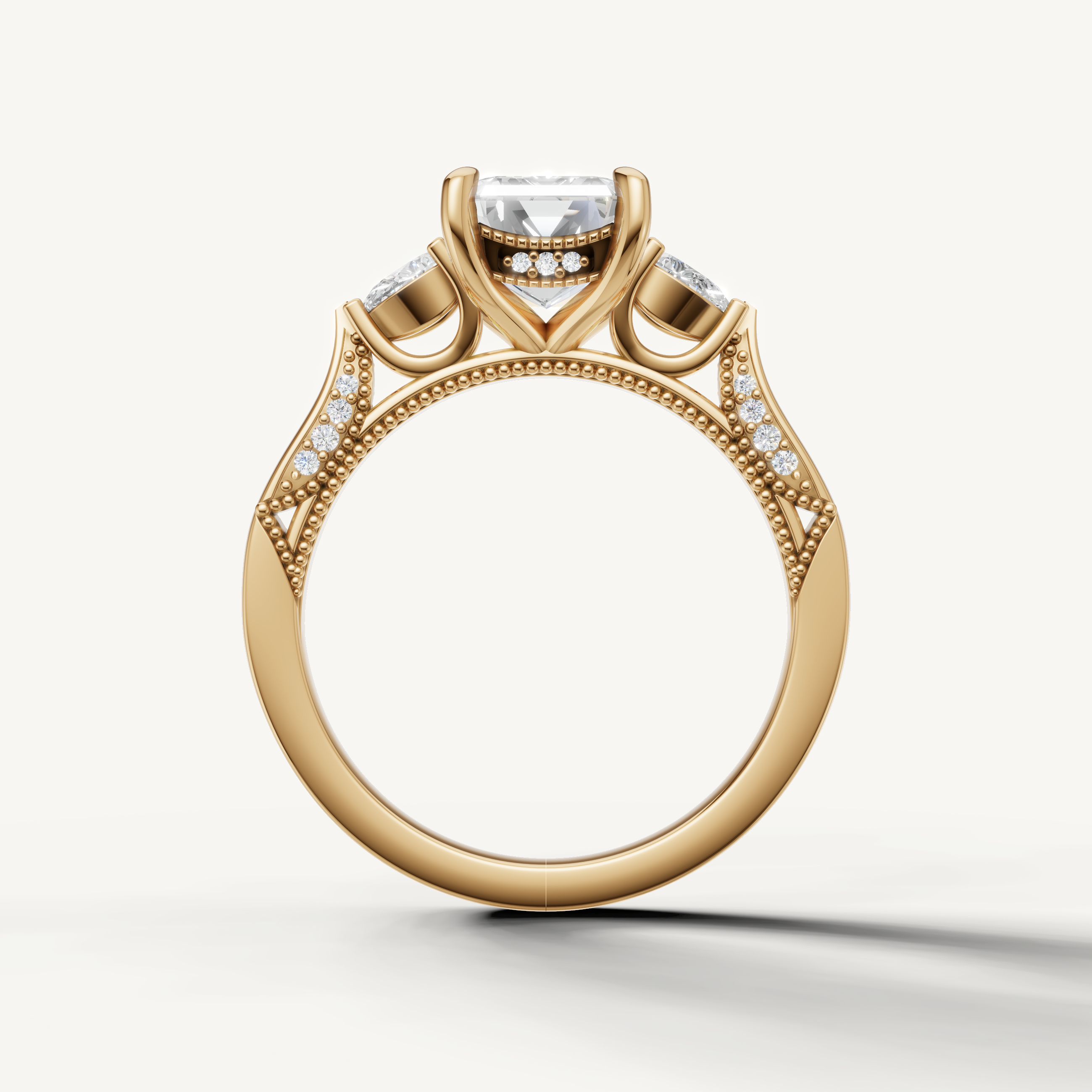 Emerald shape lab grown diamond engagement ring with side pear diamonds yellow gold luxury style
