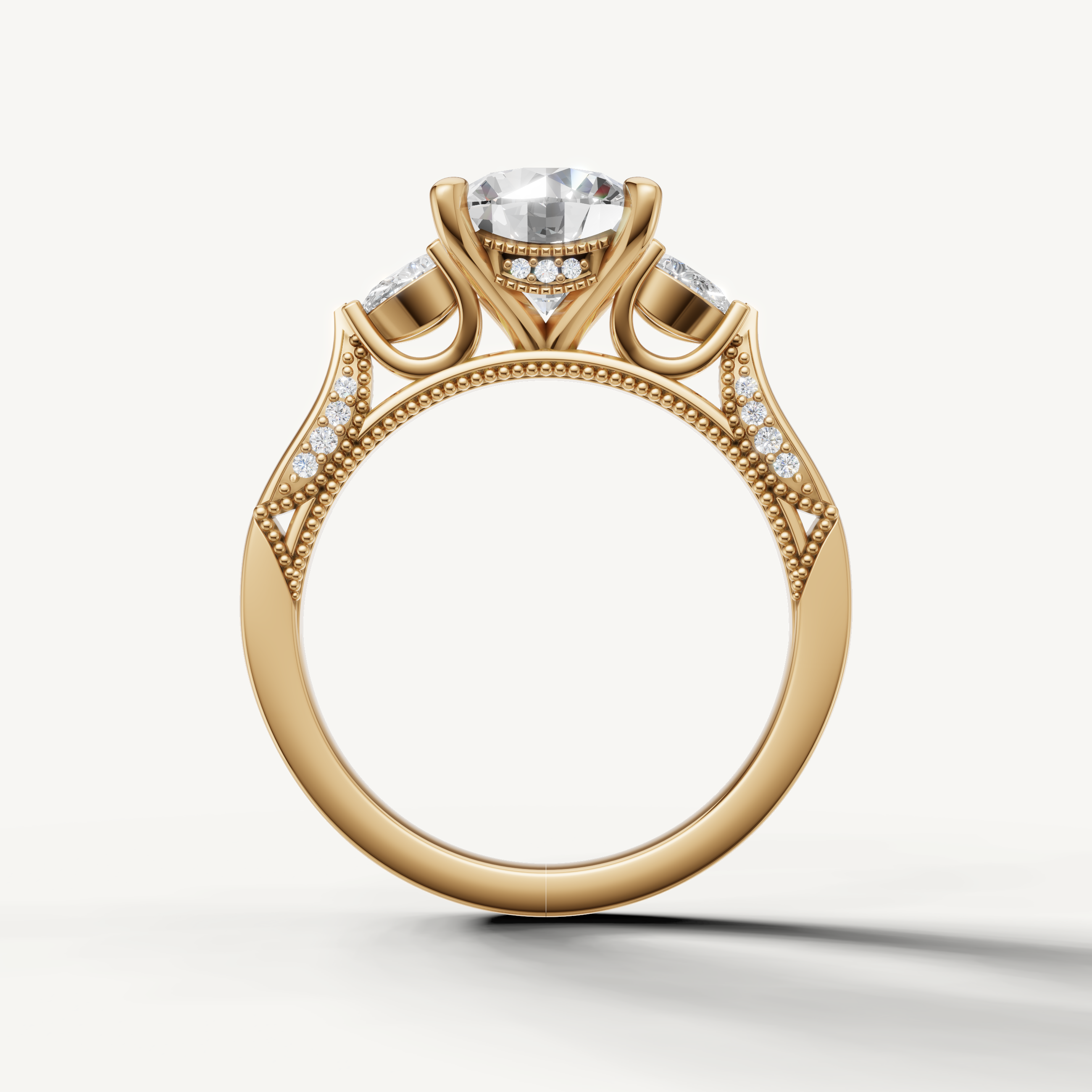 Round cut lab grown diamond engagement ring with pear side diamonds yellow gold luxury