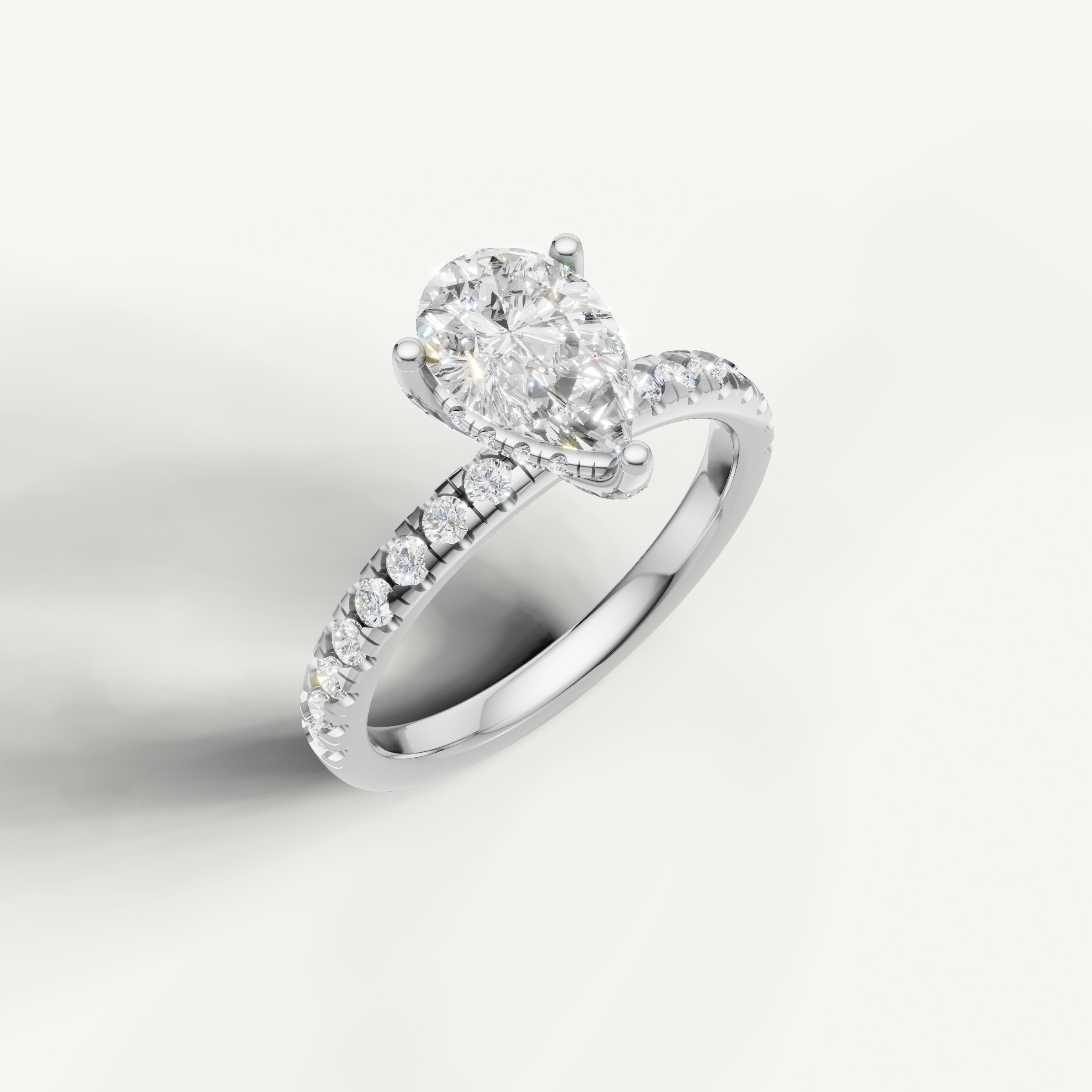 teardrop diamond engagement ring with micro pavé band 14k white gold
