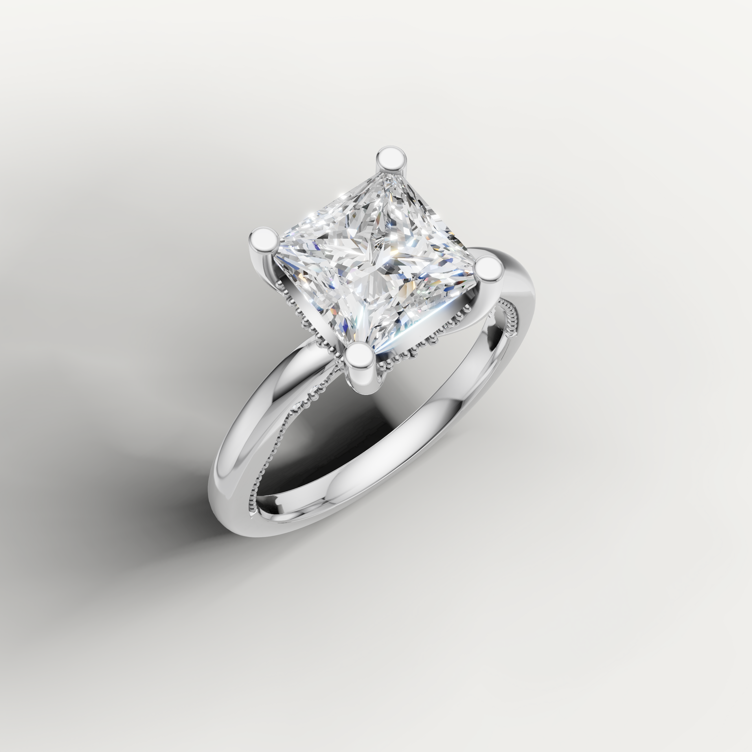 A sleek, silvery-white band holding a prominent square princess-cut center stone, designed for a clean and elegant profile.