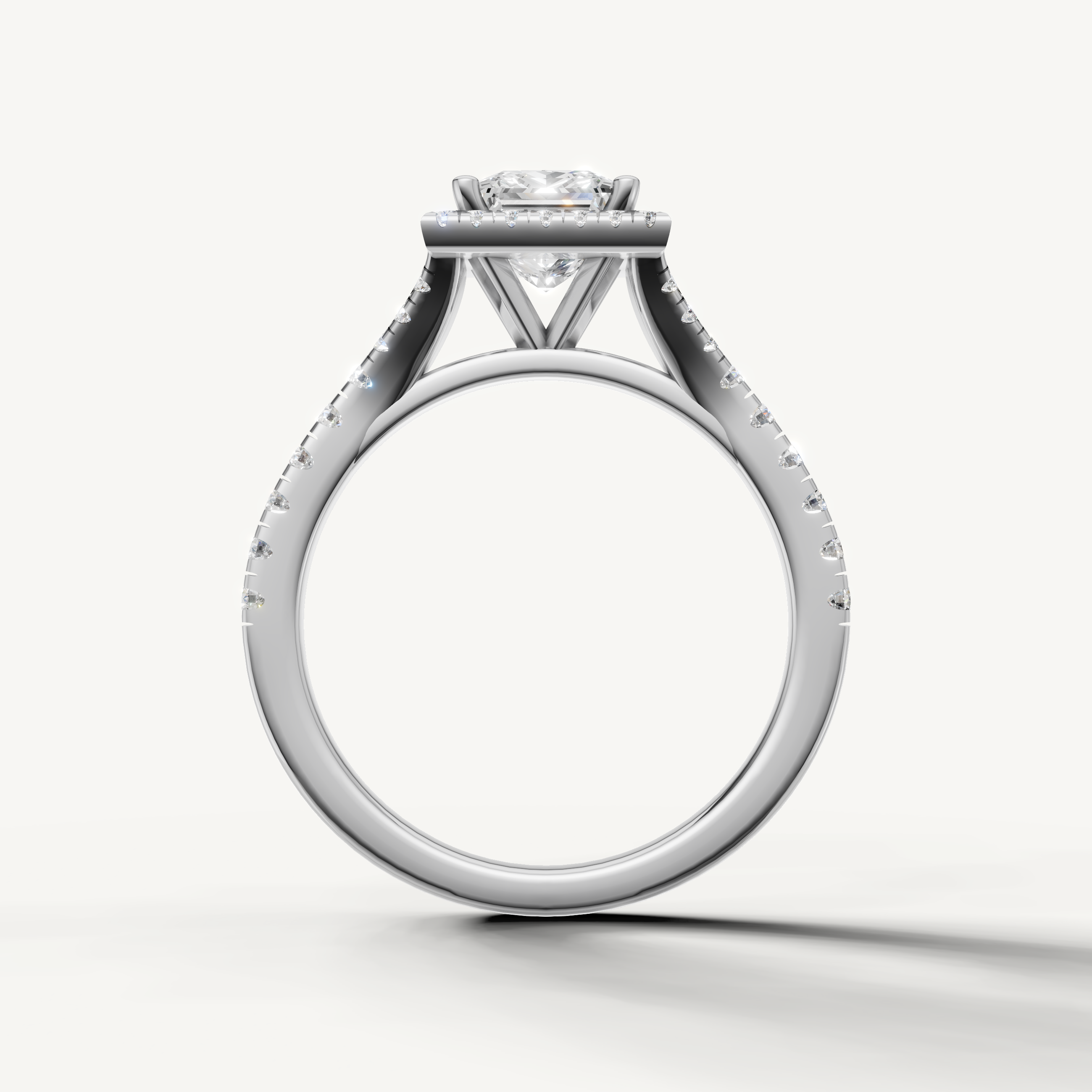Princess cut engagement ring with halo and pavé band white gold