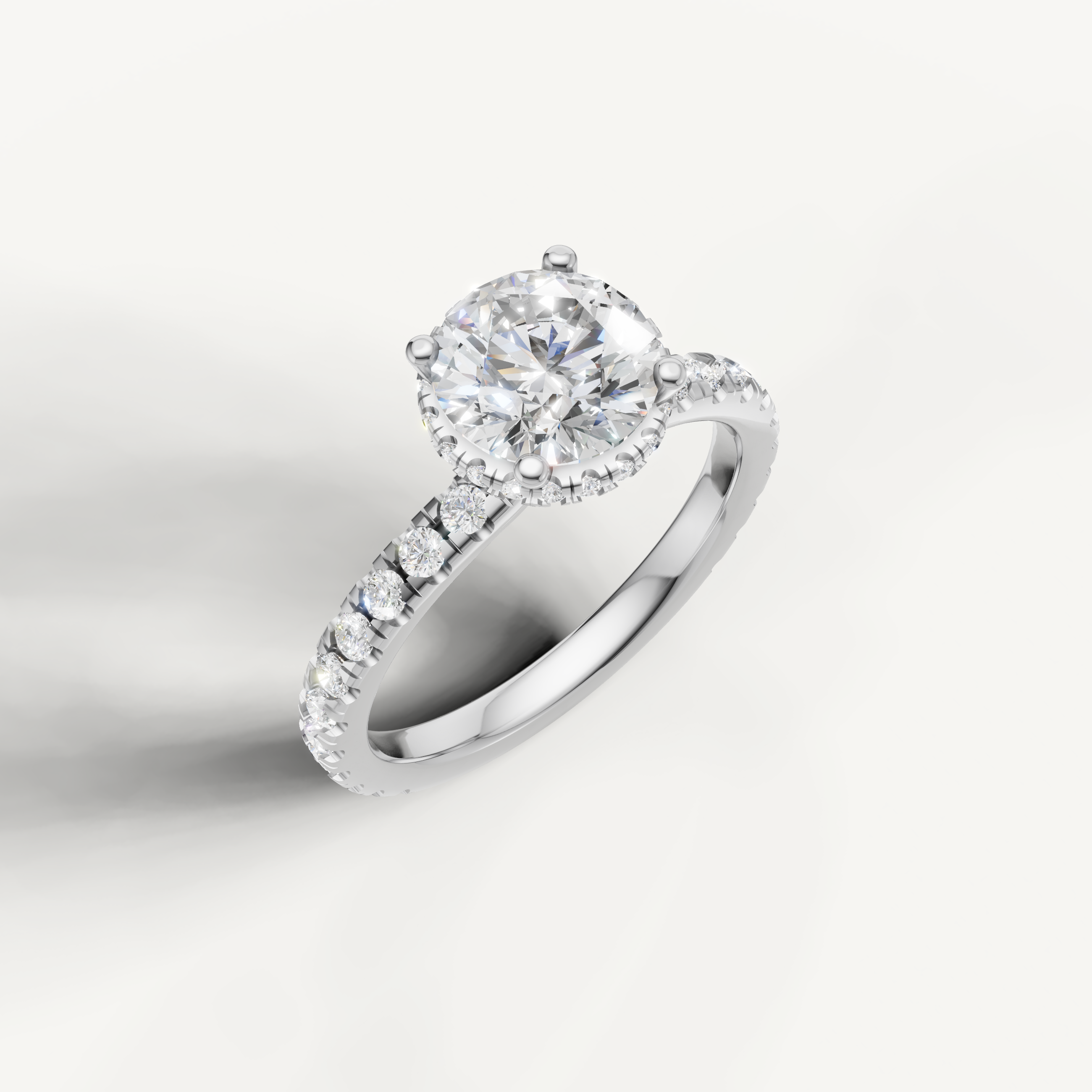 luxurious round lab grown diamond engagement ring in 14k white gold with hidden halo and sparkling pavé design