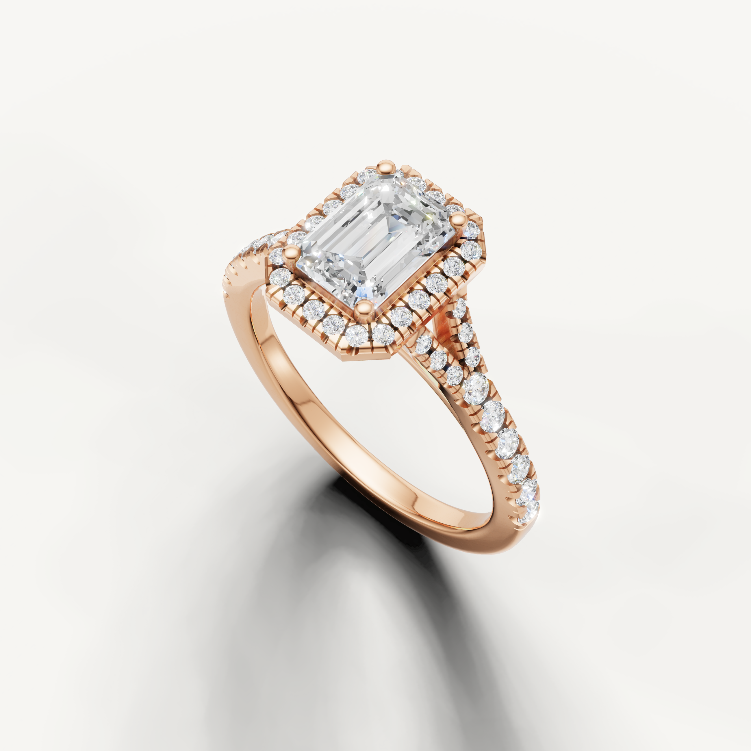 Vintage inspired emerald cut diamond halo ring with pavé band rose gold