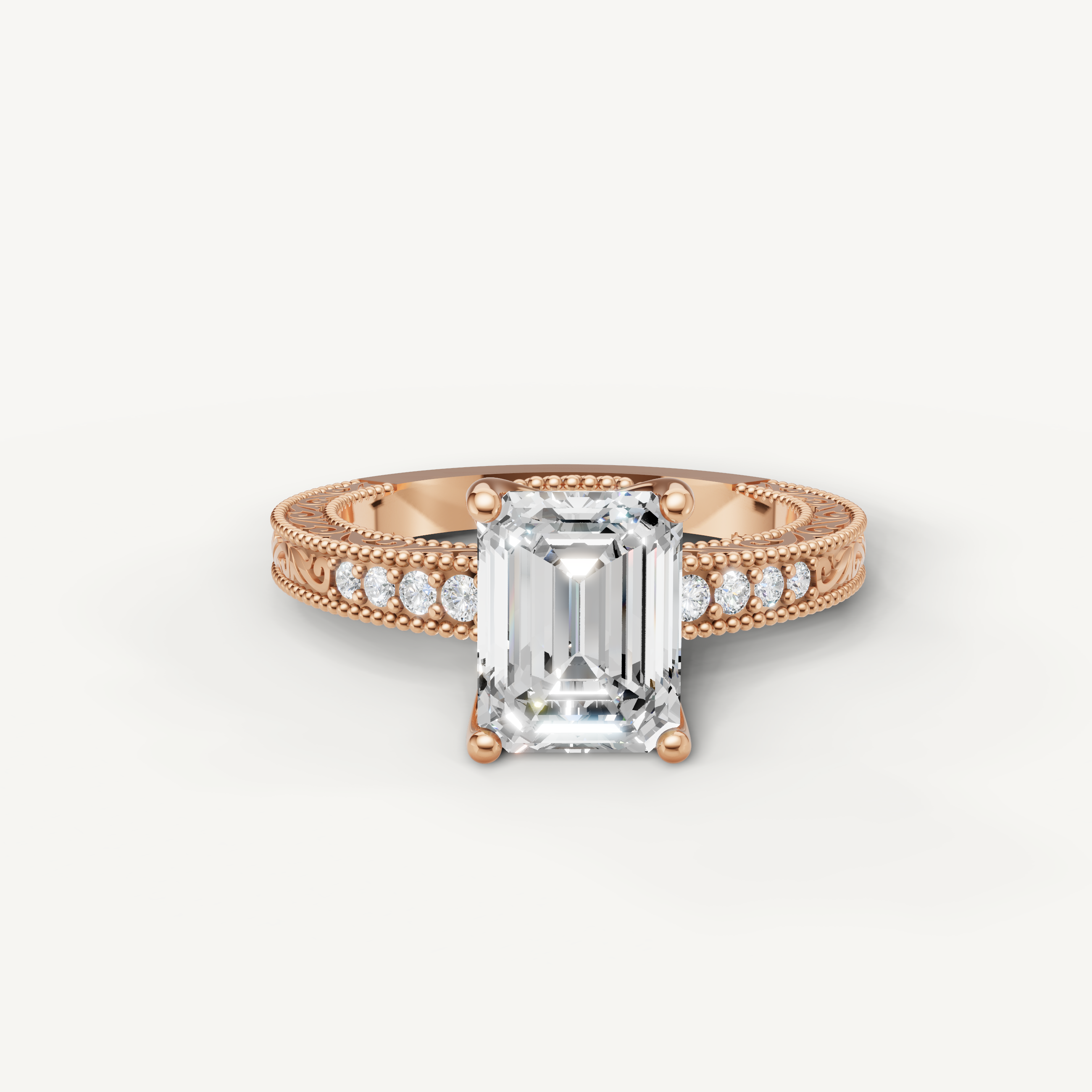 Vintage emerald cut lab grown diamond engagement ring in 14K rose gold with detailed milgrain and pavé accents by Raul Diamonds.
