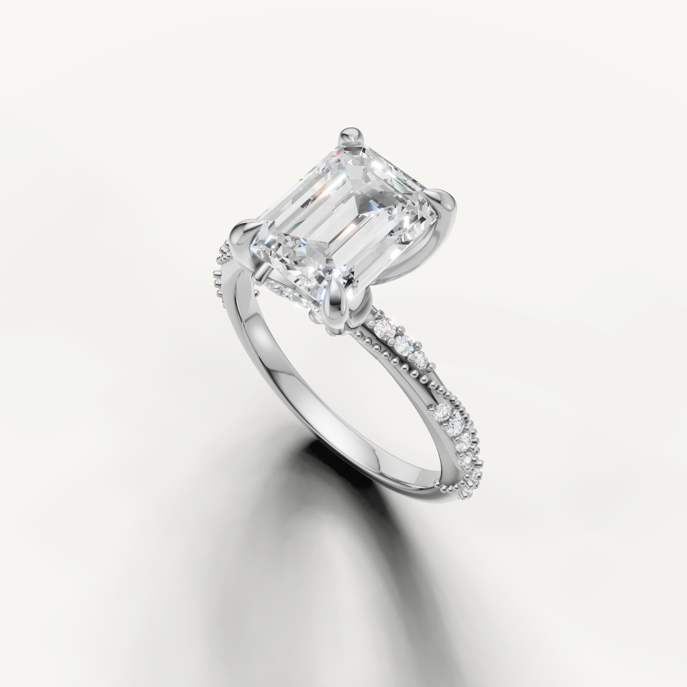 vintage inspired emerald cut diamond ring with milgrain twisted pavé setting white gold