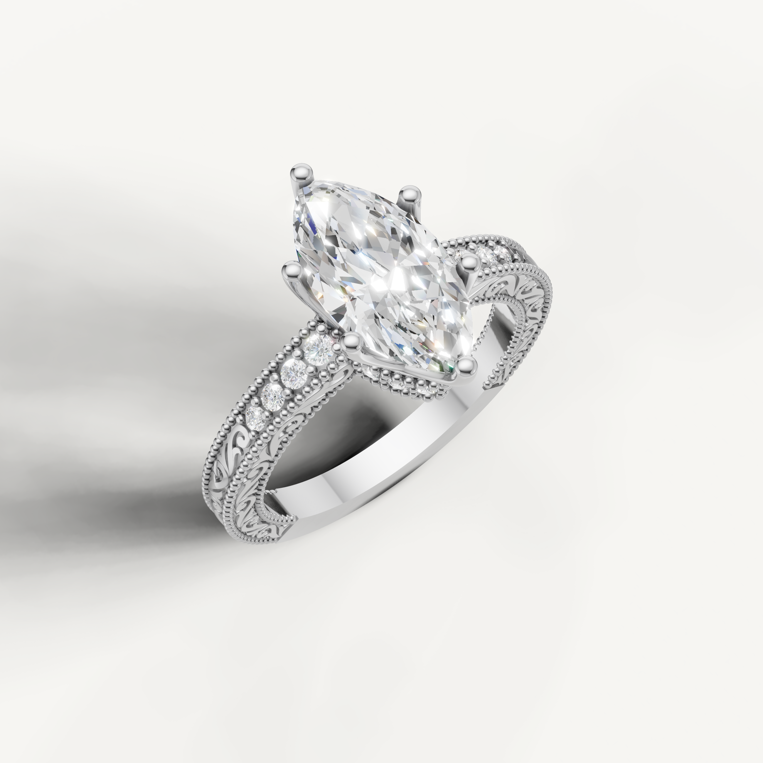 White gold marquise cut lab grown diamond ring featuring antique-style scrollwork and milgrain craftsmanship by Raul Diamonds.