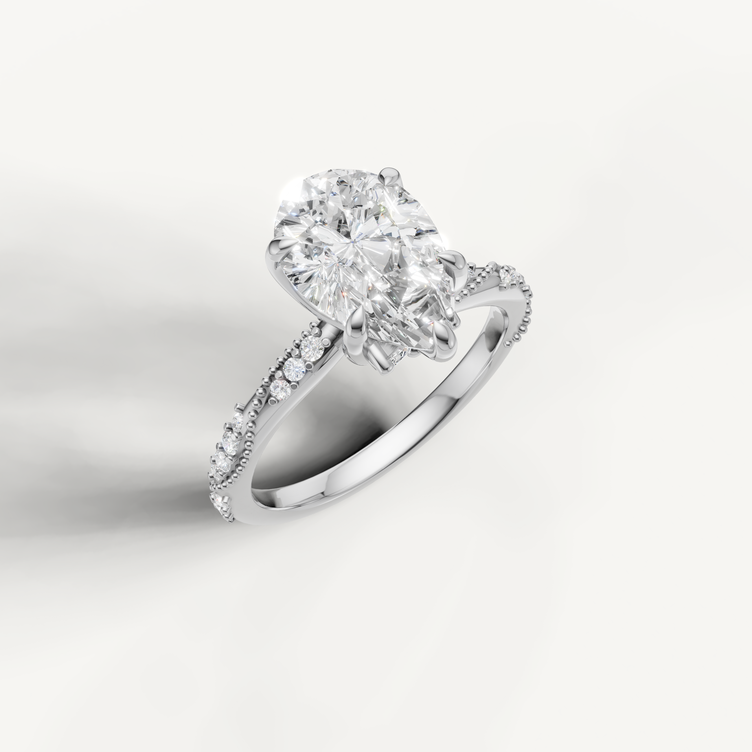 IGI certified pear lab diamond ring with crossover pavé shank 14k white gold
