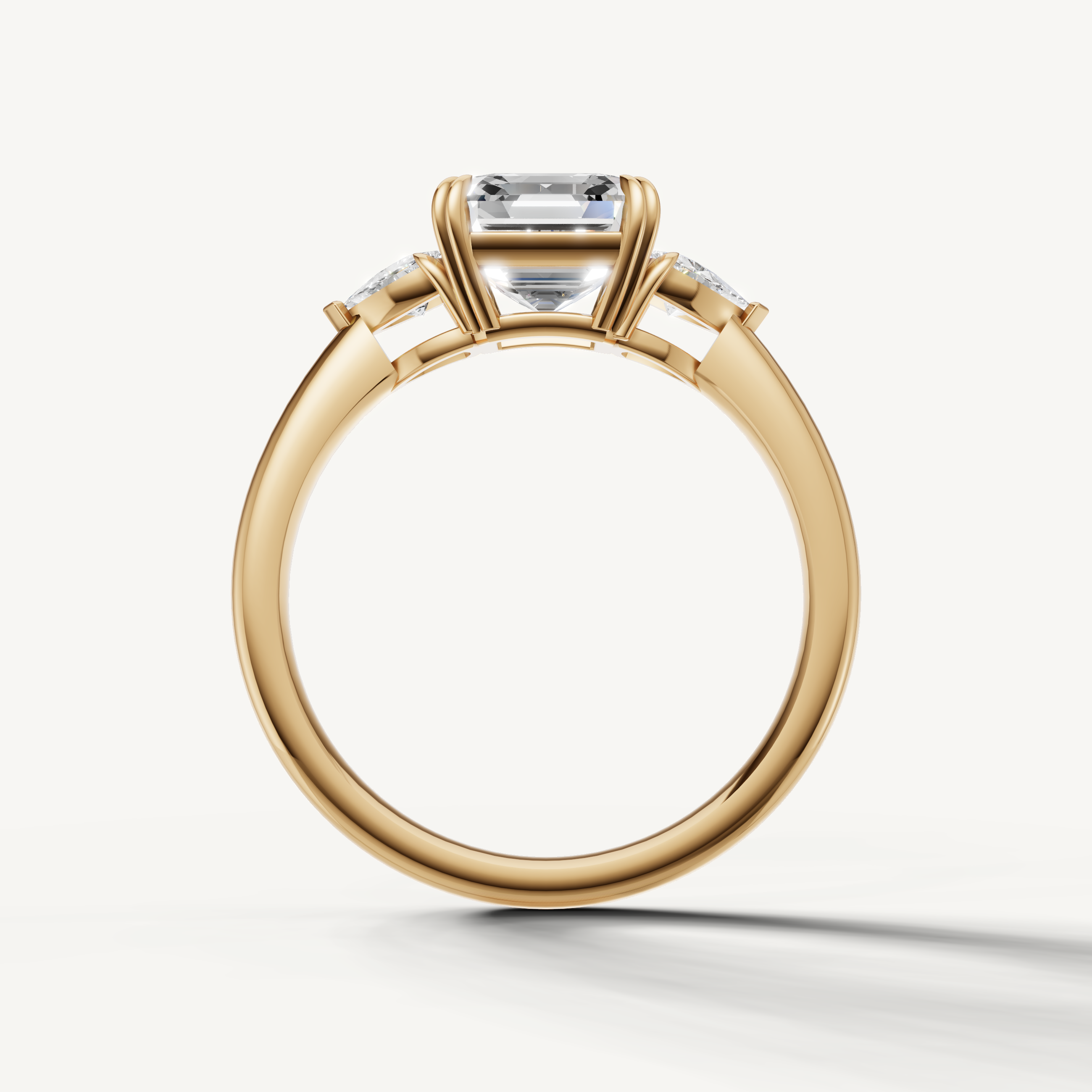 elegant three stone lab grown diamond ring with asscher center stone and trillion side diamonds
