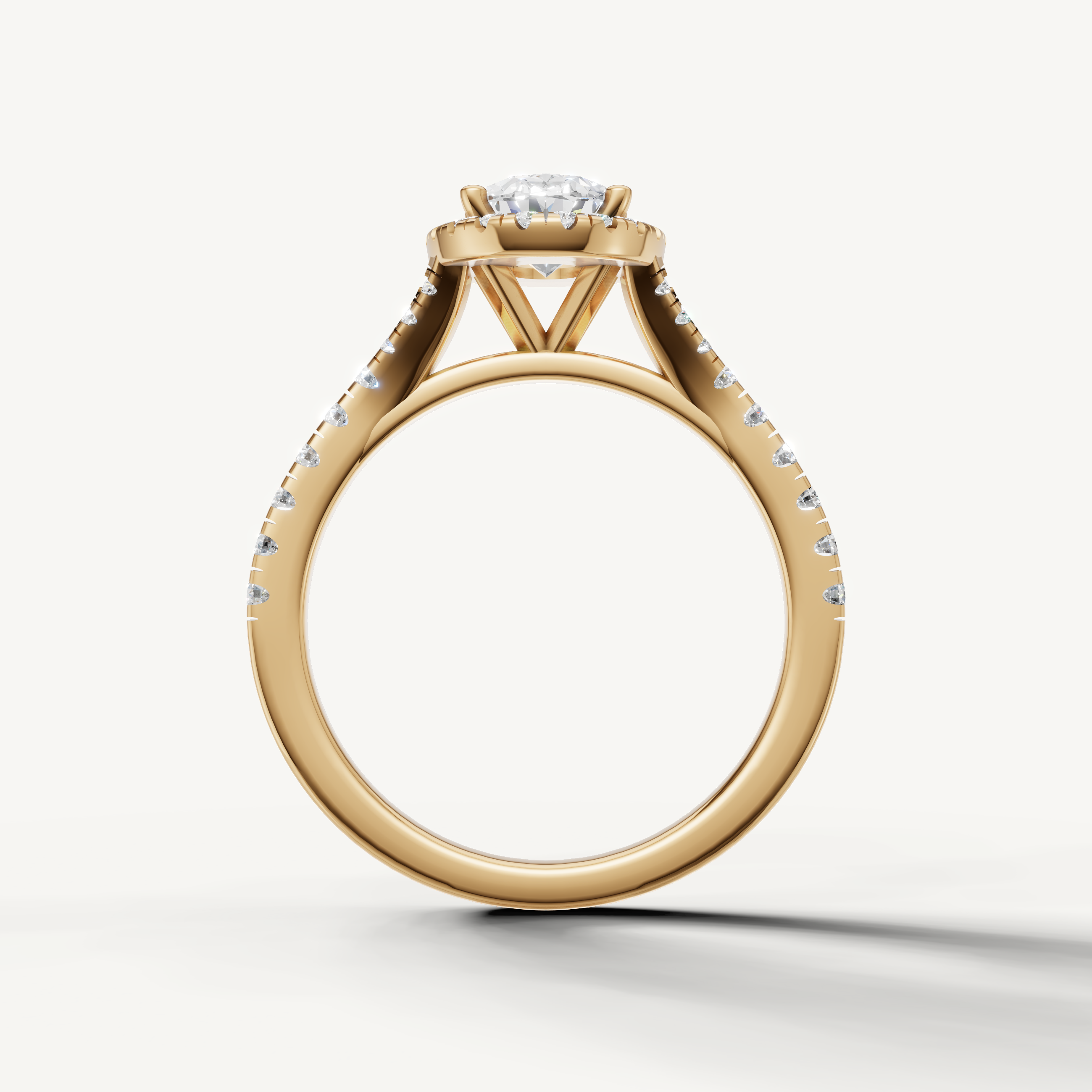 Elegant oval cut halo diamond ring with pavé band yellow gold