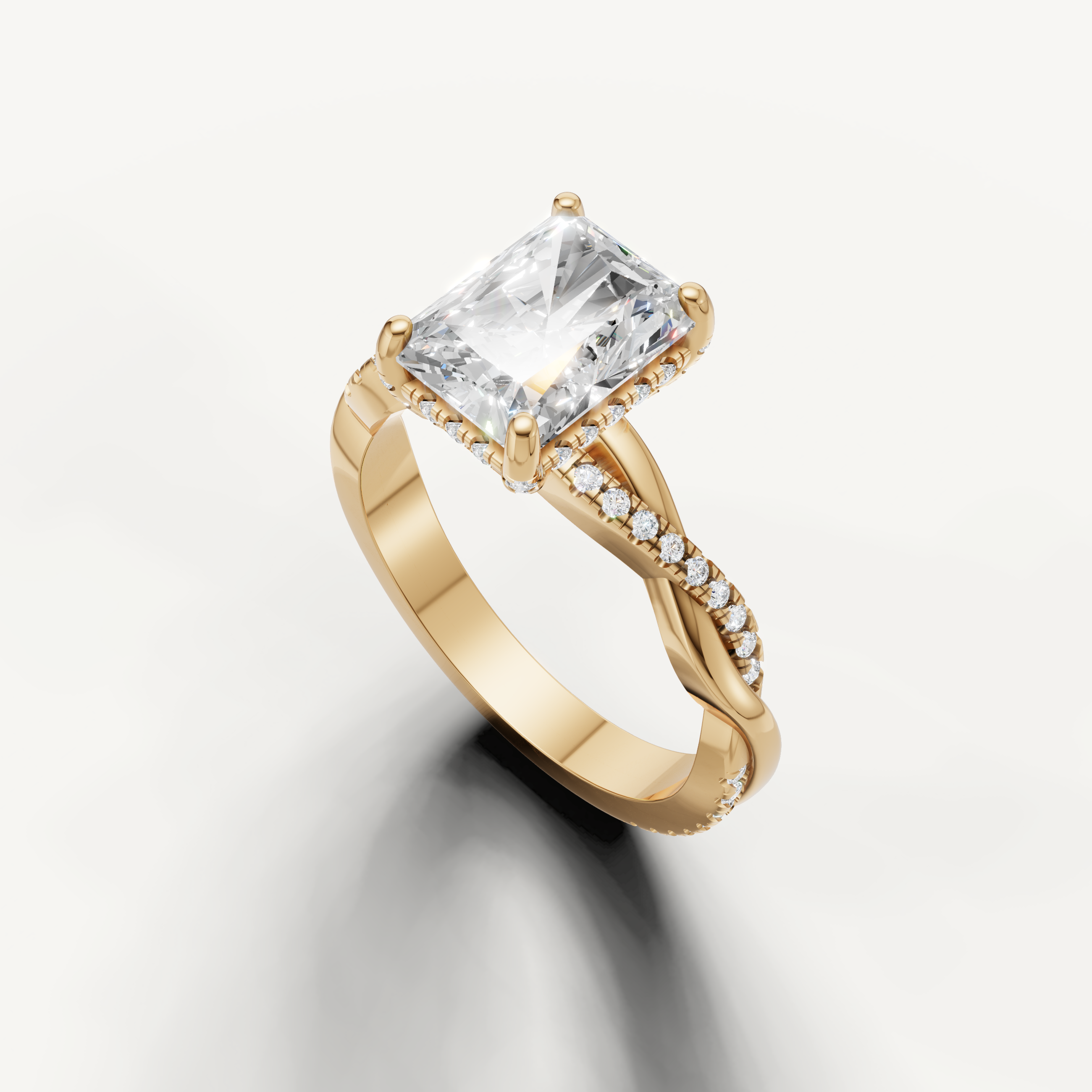 14k yellow gold radiant cut lab grown diamond ring featuring a modern bypass pavé design