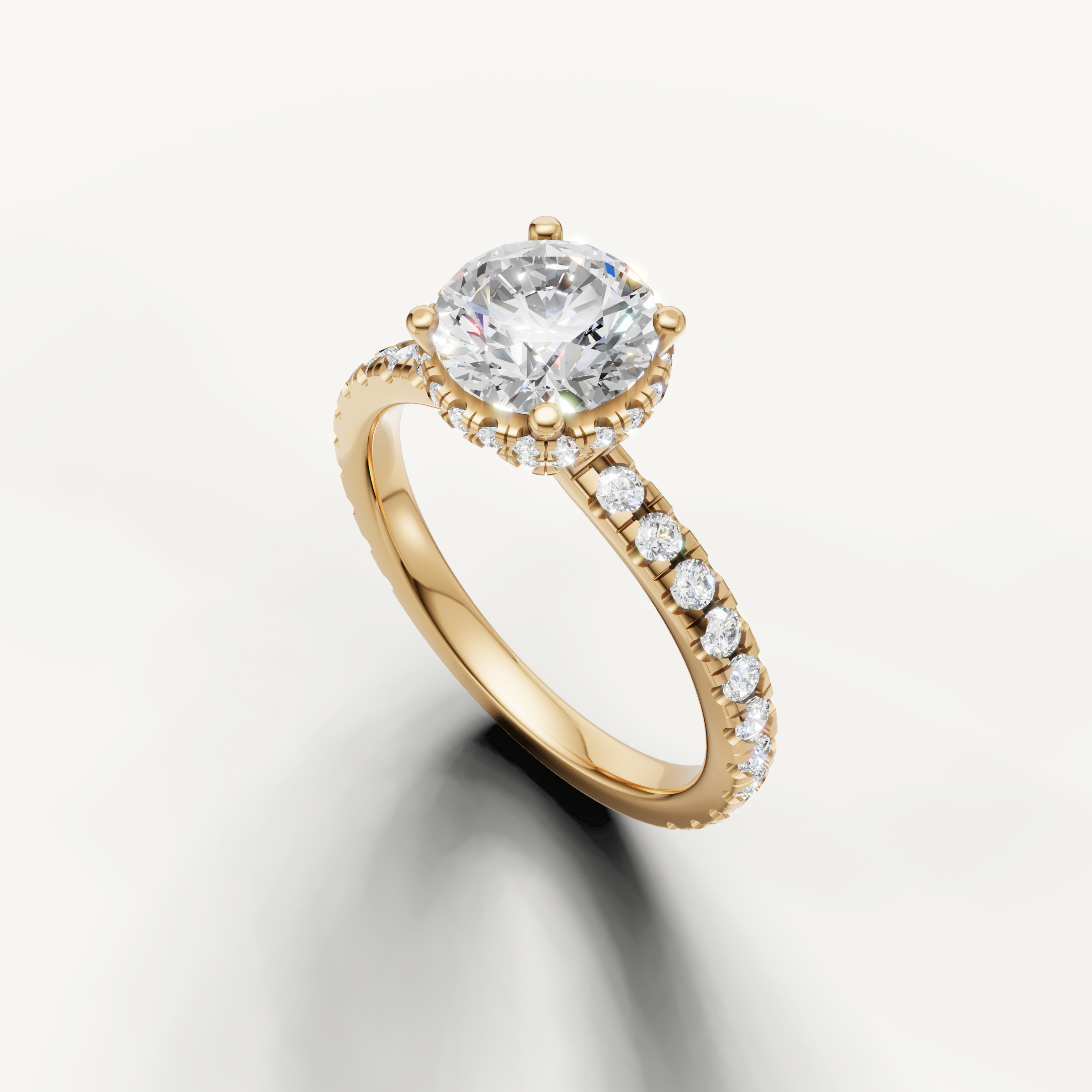 14k yellow gold round brilliant lab grown diamond ring with hidden halo detail and shimmering pavé band