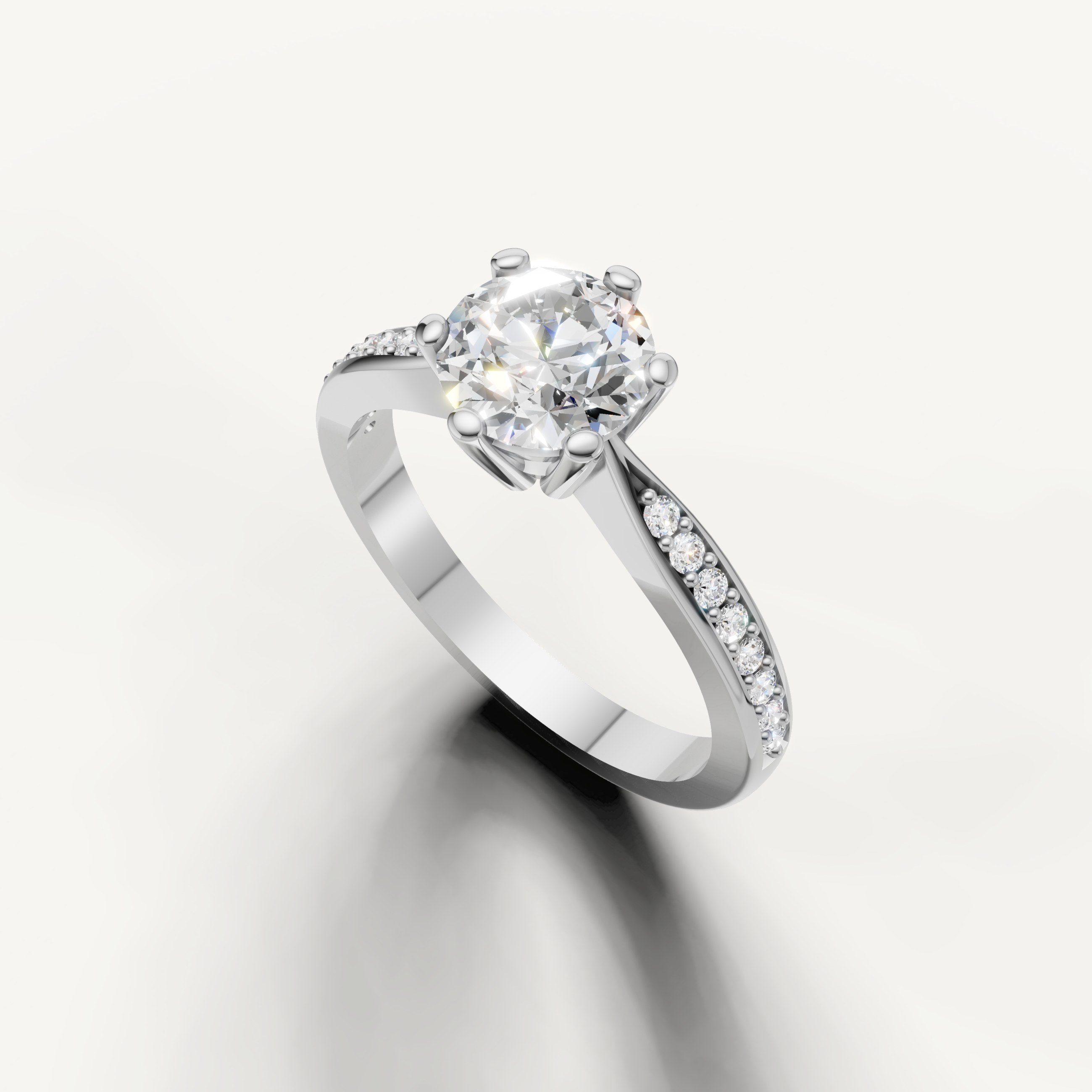 Handcrafted round solitaire engagement ring by Raul Diamonds in luxury gold setting