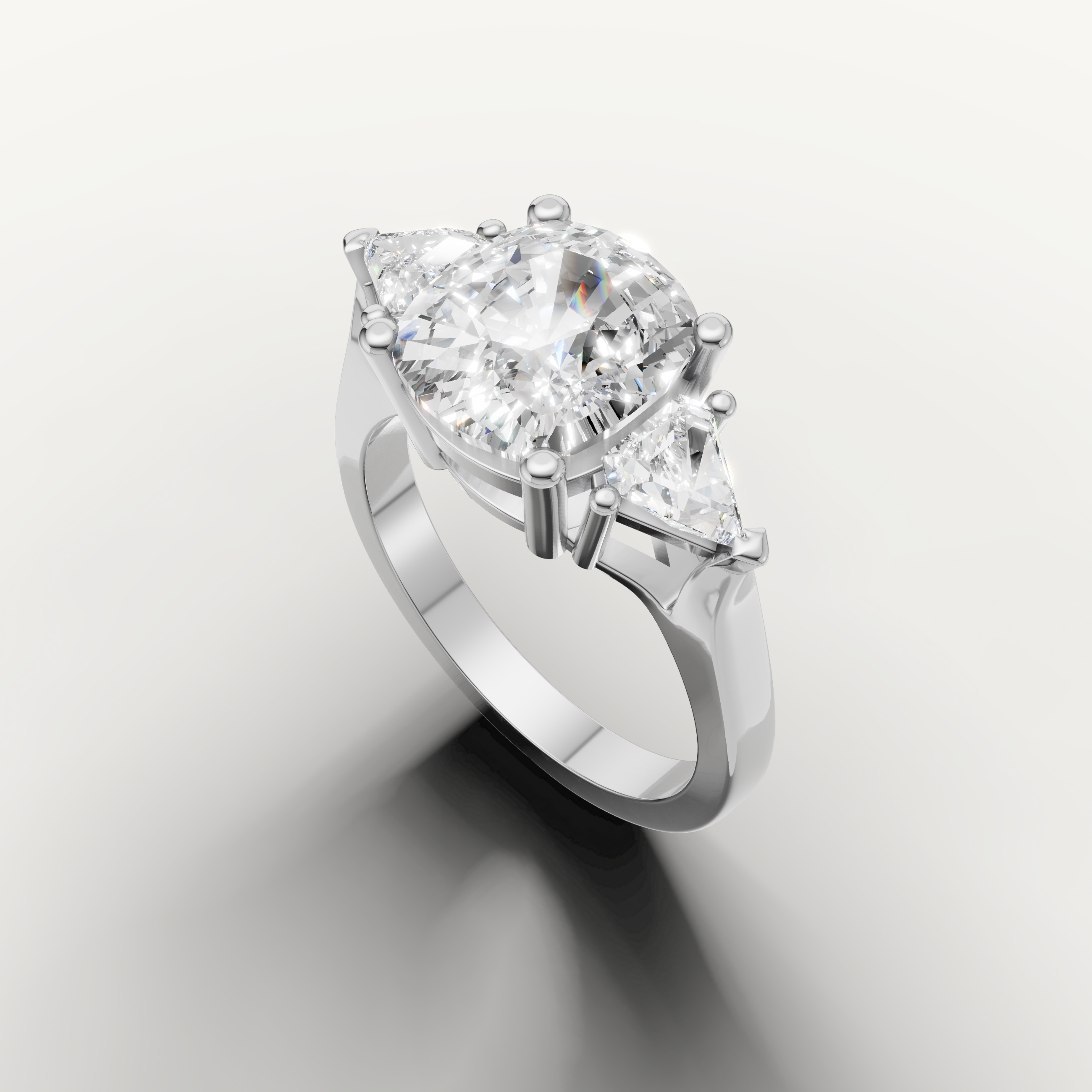 Handcrafted round three stone engagement ring by Raul Diamonds in gold setting