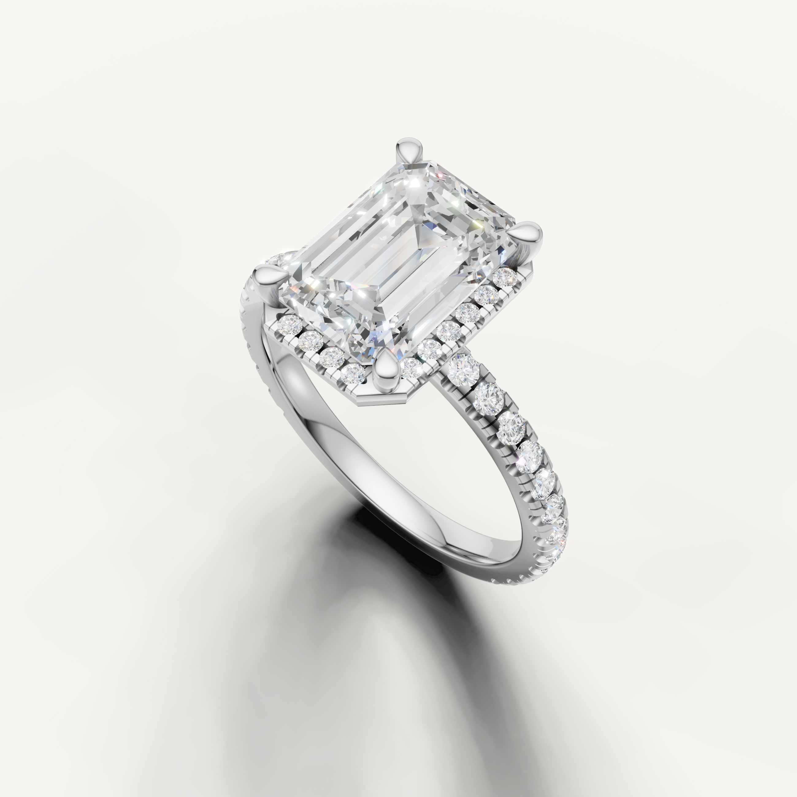 Emerald cut solitaire diamond ring with hidden halo pavé band white gold elegant design