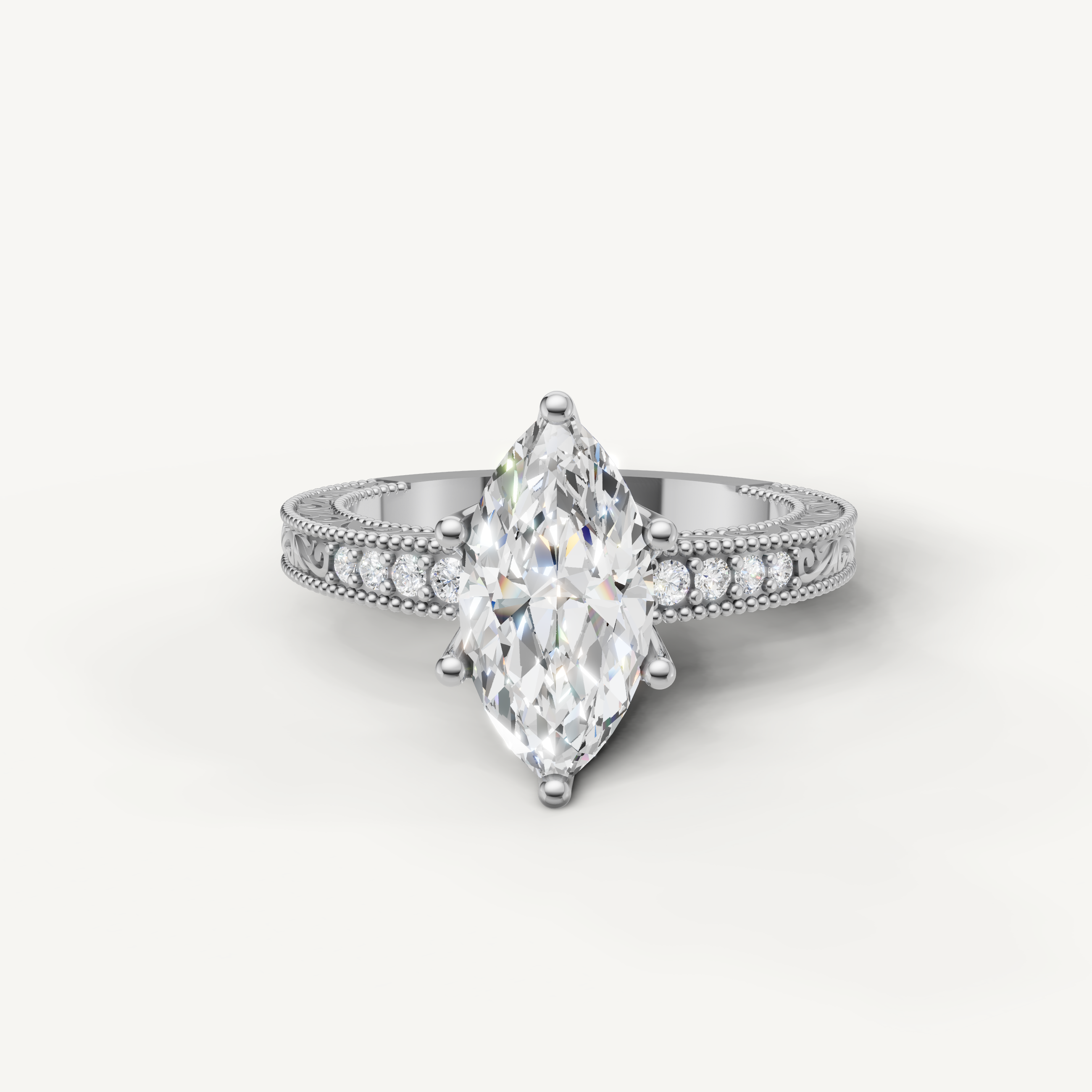 Vintage marquise cut lab grown diamond engagement ring in 14K white gold with ornate filigree and pavé accents by Raul Diamonds.